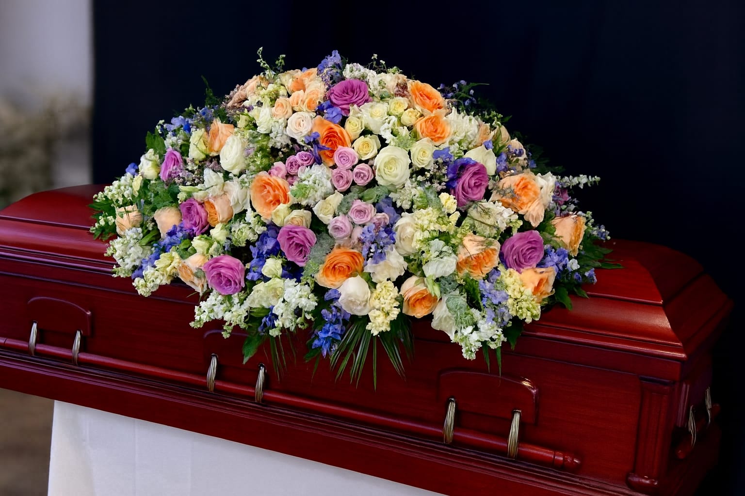 Loving Memory Loving Memory - Elegant Funeral Spray A graceful display of roses, lisianthus, and seasonal blooms in soft shades of peach, lavender, ivory, and blue. This arrangement is designed to honor a loved one’s memory with beauty, peace, and dignity — offering comfort and a heartfelt farewell. ️