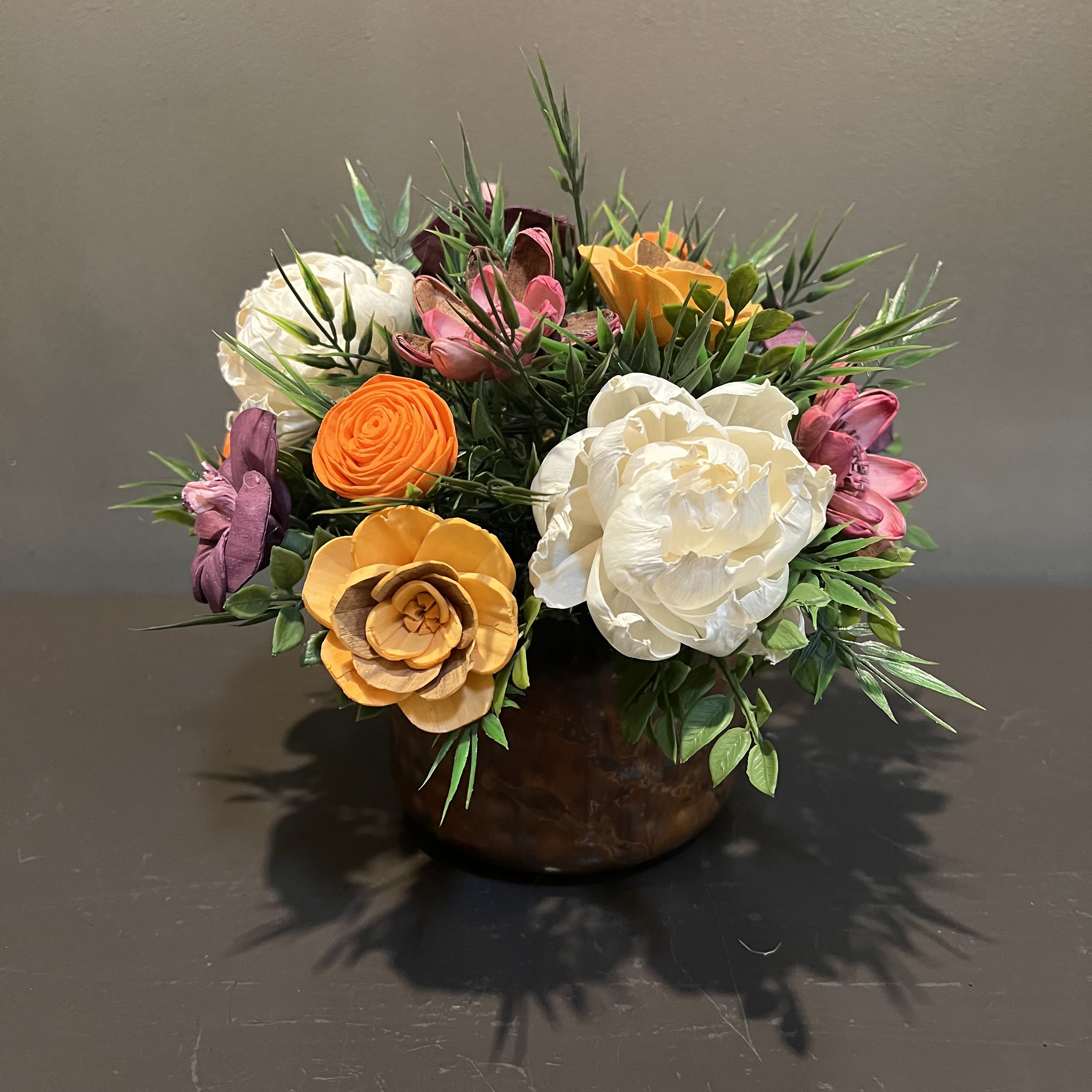 Sola Wooden Flower Centerpiece - Chic Charm Sola Wooden Flower Centerpiece - Chic Charm - Hand-dyed and hand-crafted in Minneapolis, these flowers made of balsa wood are a wonderful everlasting floral arrangement - great for those with allergies! Can be used as a natural essential oil diffuser too! Arrives in a keepsake vase. Approx. Dimensions: 11"Tx10"W