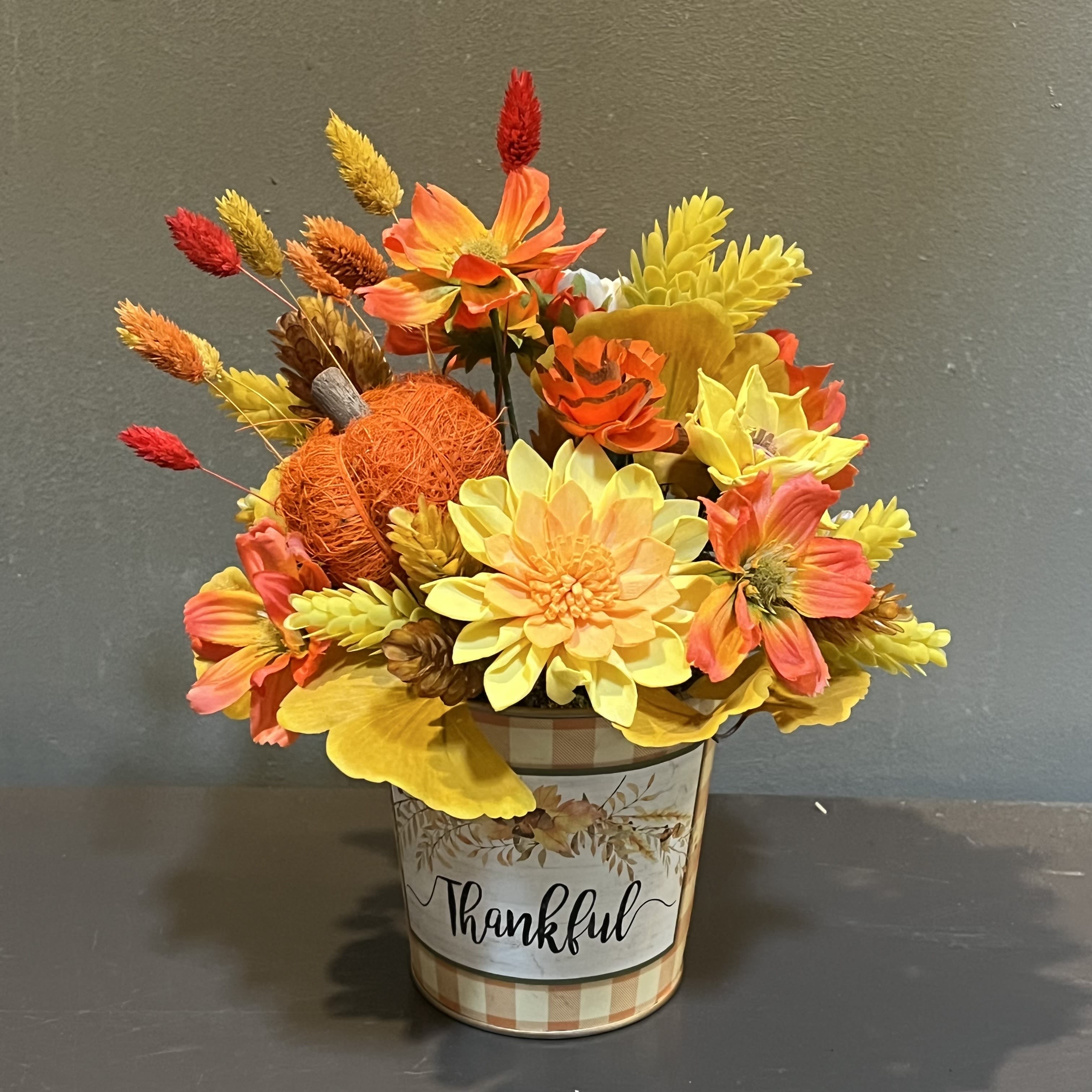 Sola Wooden Flower Centerpiece - Thankful - Hand-dyed and hand-crafted in Minneapolis, these flowers made of balsa wood are a wonderful everlasting floral arrangement - great for those with allergies! Can be used as a natural essential oil diffuser too! Approx. Dimensions: 12&quot;Tx9&quot;W. arrangement arrives in a keepsake vase.