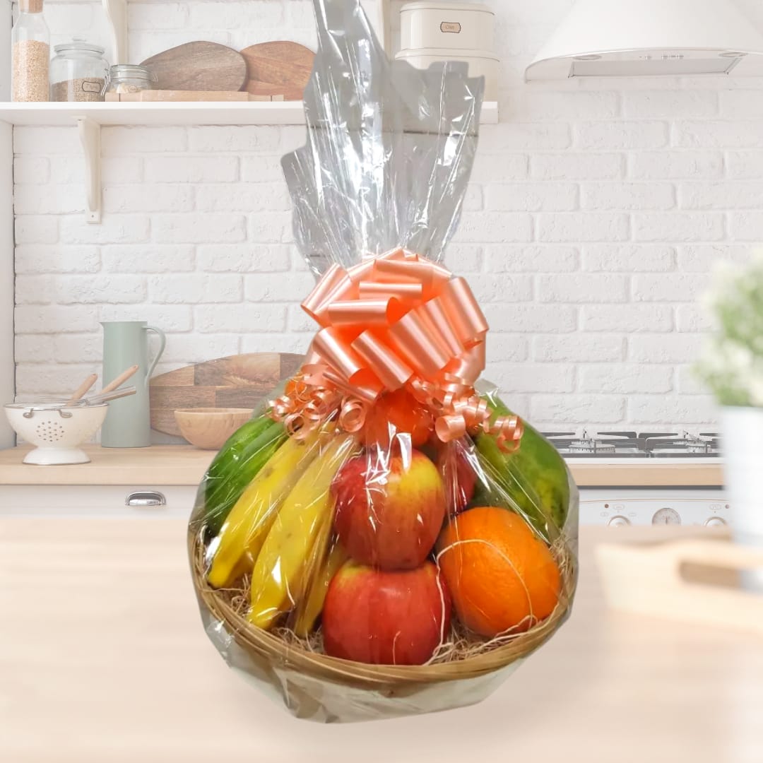 Local Fruit Basket  - Indulge in a delightful assortment of fresh fruits prepared by our expert team! Though the selection will vary, we guarantee consistent value and quality in every basket. Perfect for any occasion, this fruit basket is a healthy and thoughtful gift.  Key Features:  Variety of Fresh Fruits: Each basket features a diverse selection of seasonal fruits, ensuring a unique and delicious assortment every time.  Consistent Value: While the specific fruits may vary, the value and quality of the basket remain consistently high, providing a delightful experience with every purchase.  Beautifully Arranged: Expertly arranged for an attractive presentation, making it a perfect gift for friends, family, or colleagues.  Healthy and Thoughtful: Ideal for any occasion, from birthdays and celebrations to get-well-soon wishes or simply as a gesture of appreciation.  Enjoy the freshness and variety of our Assorted Fresh Fruit Basket, and share the joy of healthy, delicious fruits with your loved ones.       
