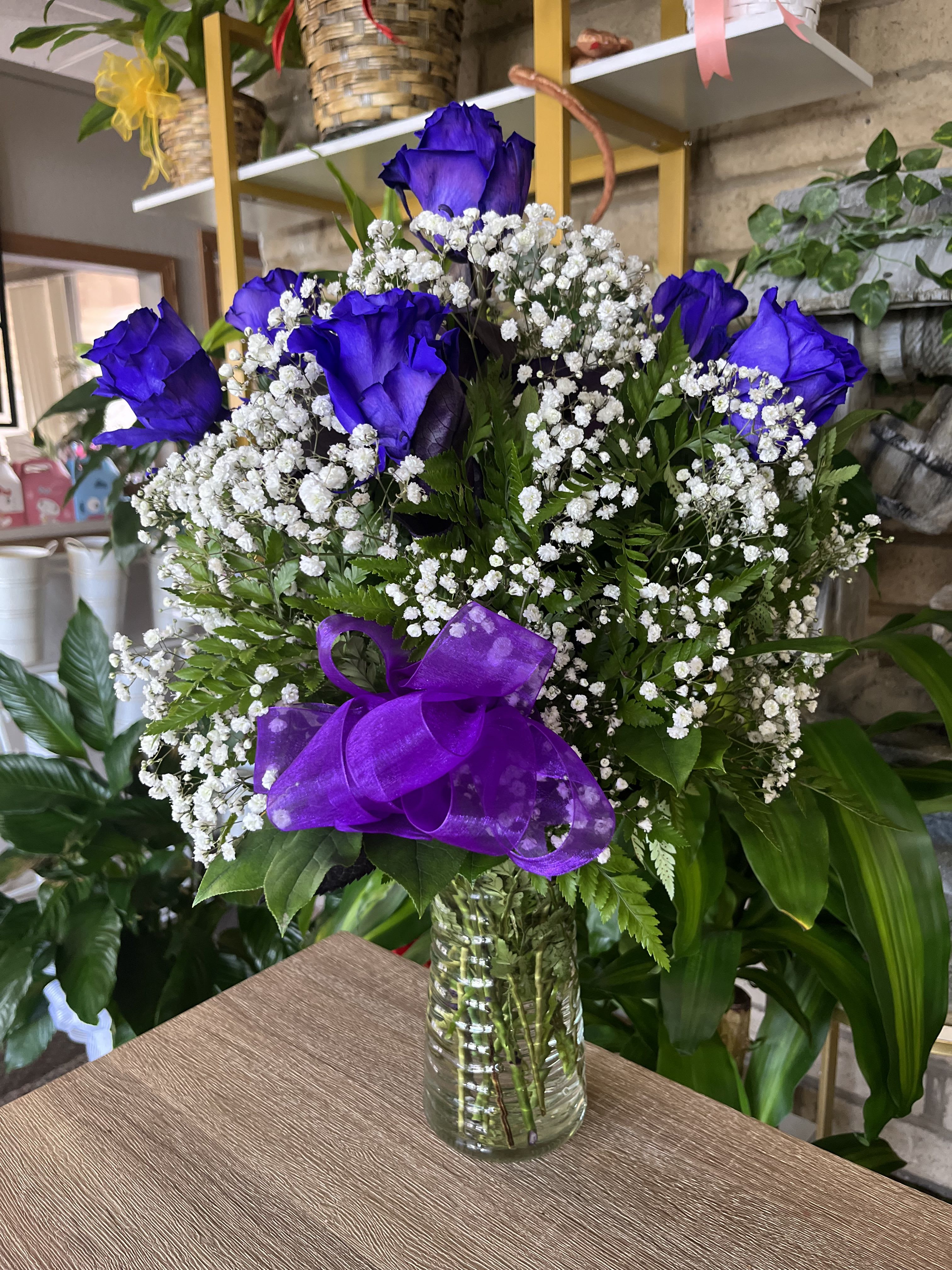 Purple Roses  - purple roses in vase with greenery and baby breath 