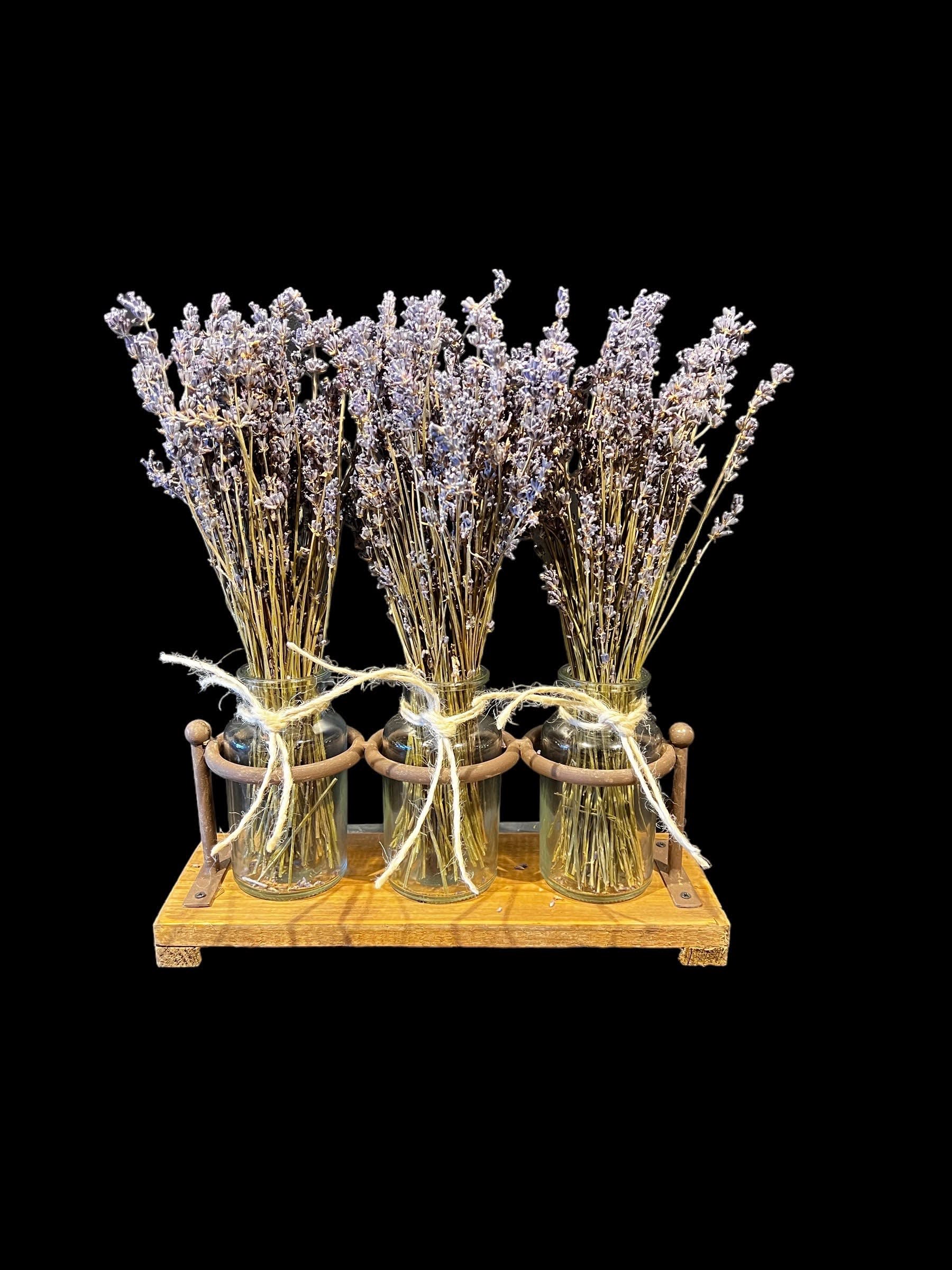 Dried Lavender Trio Dried Lavender Trio - A trio of dried lavender bundles in a keepsake container of wood and wrought iron. This features three vases inspired by apothecary jars. Earthy, fragrant and simple