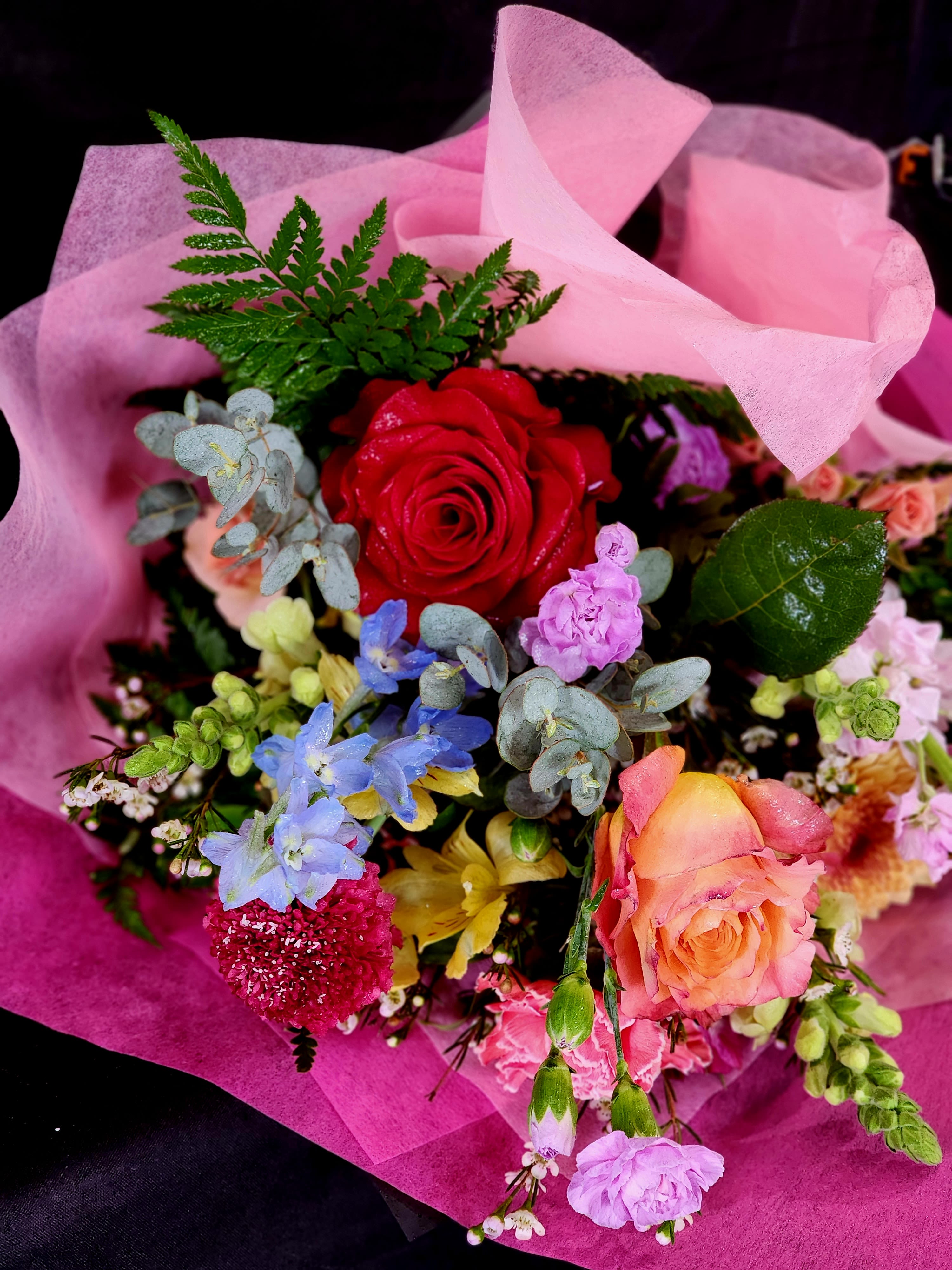 Presentation Bouquet - When you have enough vases at home....send a wrapped bouquet of seasonal flowers. Please call or write in notes if you have specific flowers or colors in mind and if you need a larger bouquet.  