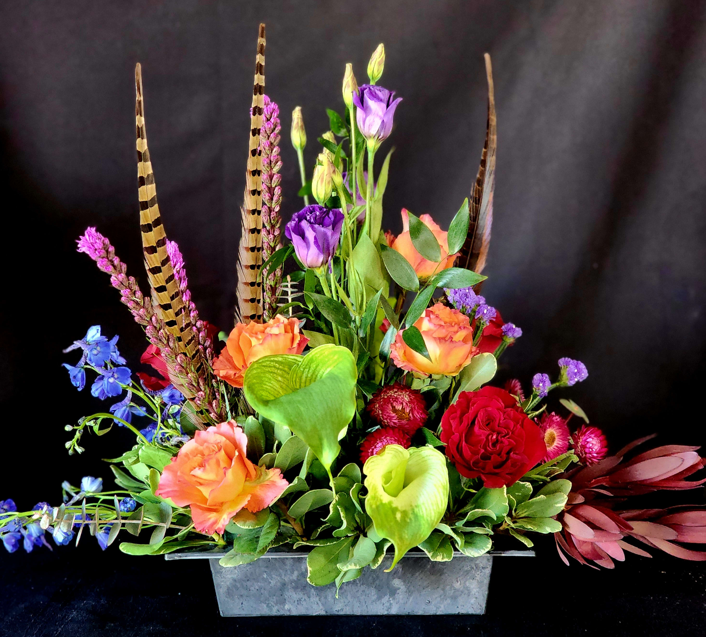Free Spirit Goddess - **One week notice required.** Free Spirit roses and seasonal flowers with feathers to fly with the Goddess.  