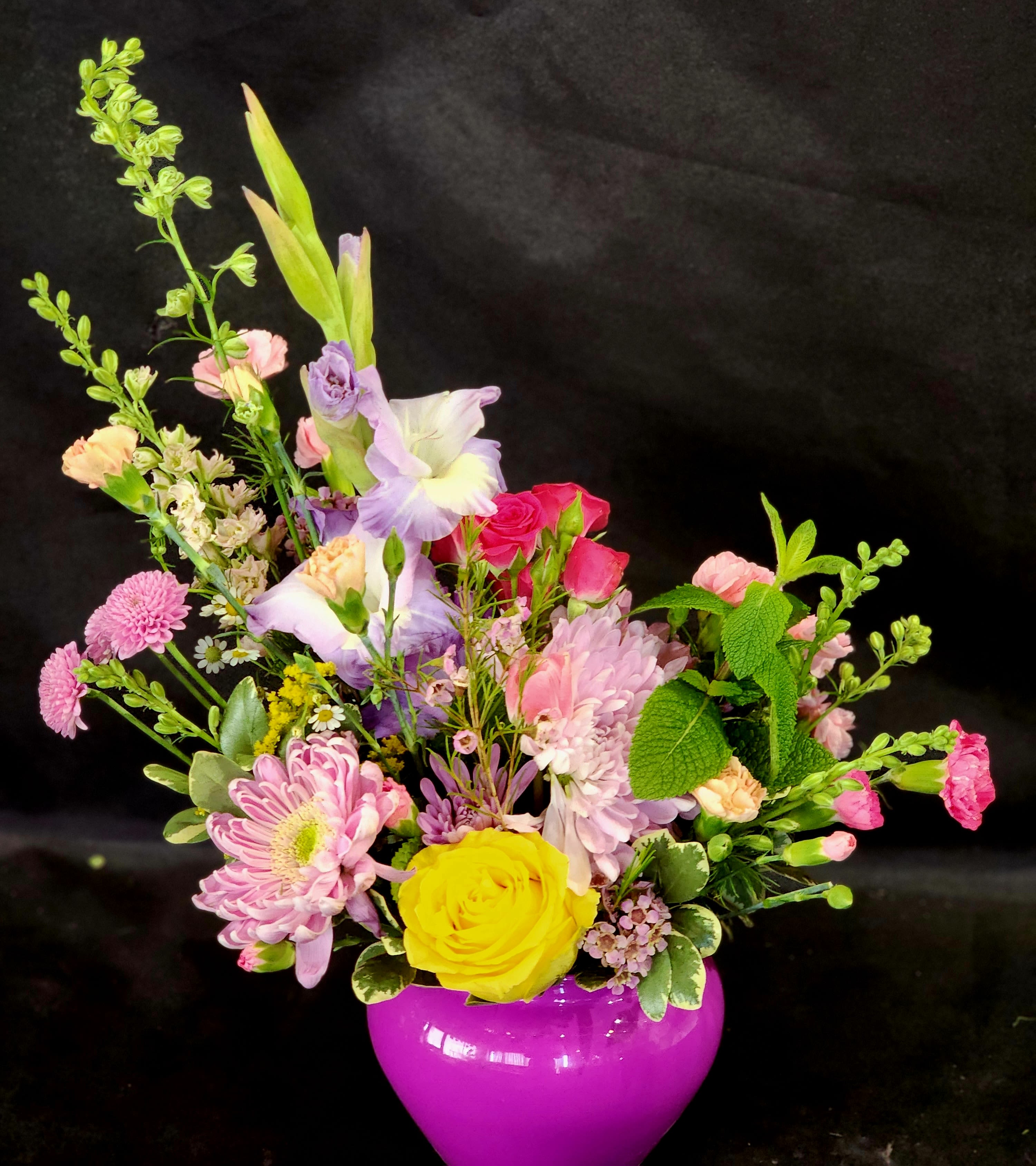 Sweet - Soft tones classic style arrangement in a biodegradable floral foam. Other colors are available.
