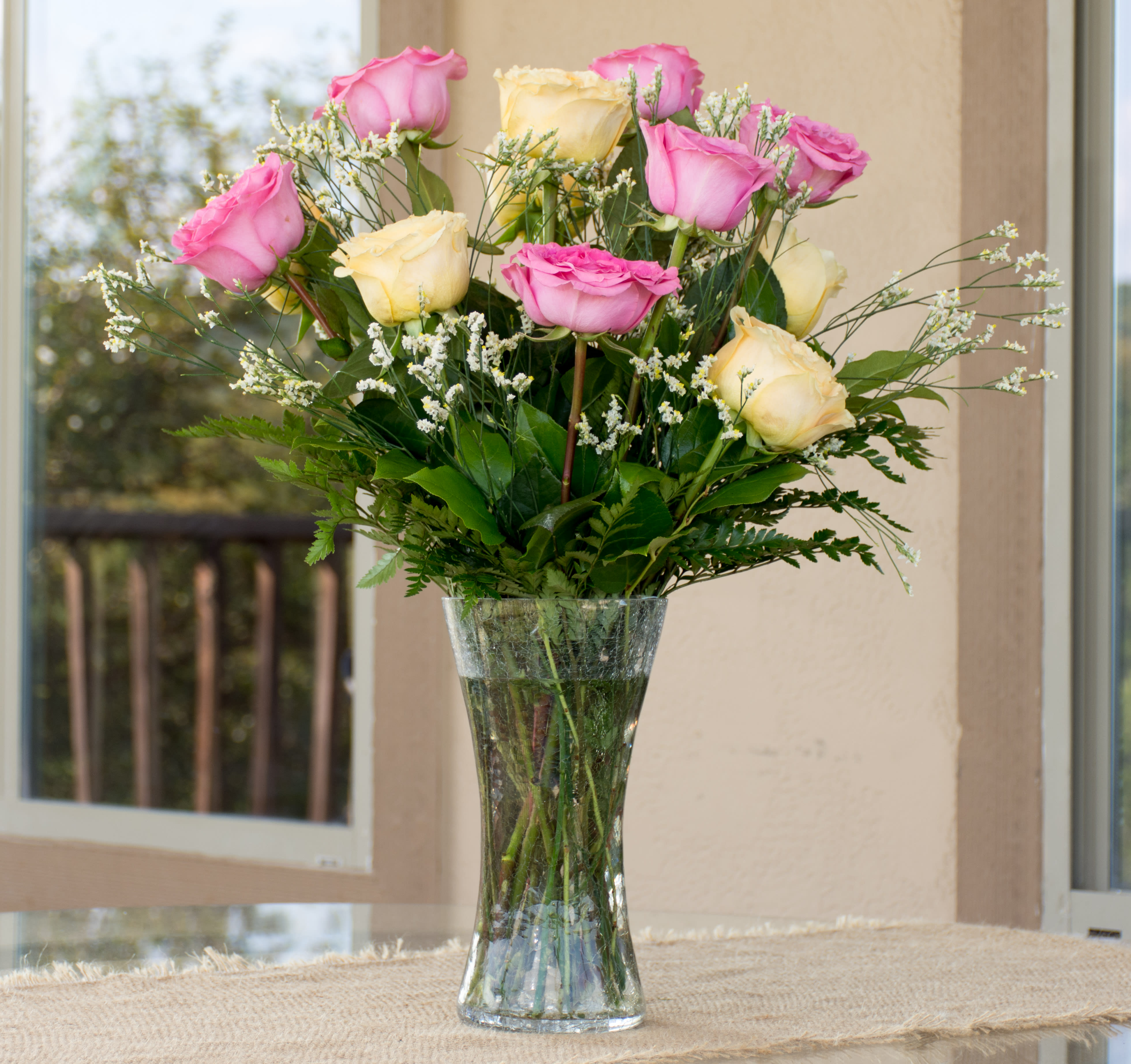 Garden Style Roses Garden Style Roses - one dozen mixed color garden style roses with filler and greenery in a beautiful vase This week I have peach and lavender roses. ( princess Crown and Queens Crown)