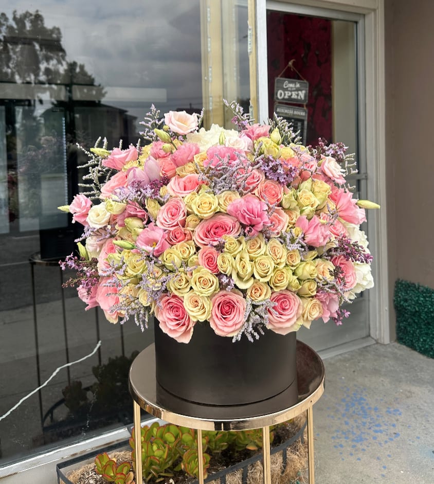 Berry beautiful Berry beautiful - Brighten any space with our Elegant Flower Box Arrangement! Bursting with vibrant blooms, this stunning display combines seasonal favorites with lush fillers. Housed in a chic, reusable container, it makes a perfect centerpiece for any occasion be it a gift or a treat for yourself. Elevate your decor with this captivating arrangement that brings joy and sophistication to your home or office. Order yours today and let the beauty of flowers inspire you!