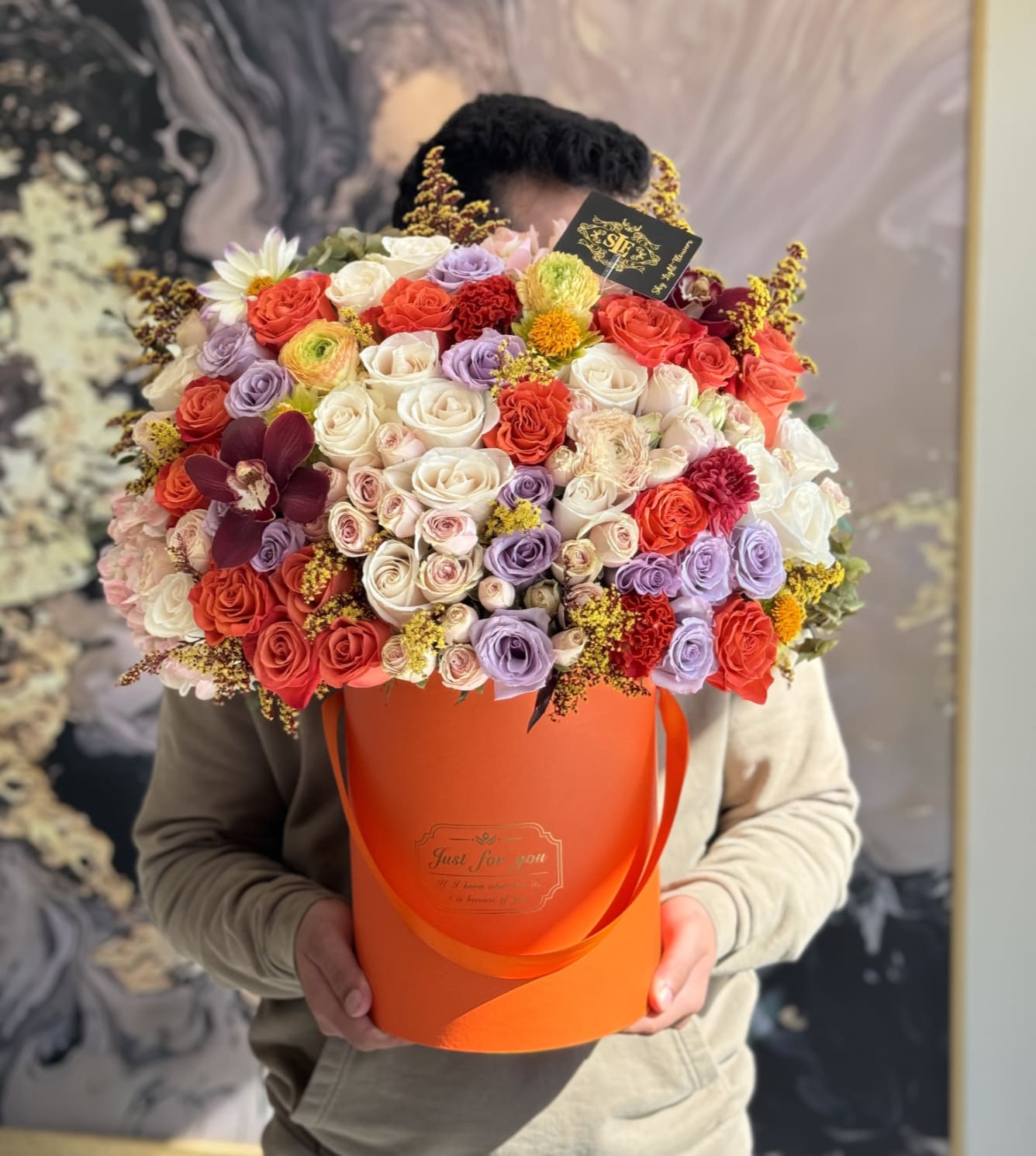 Autumn in a box  - Brighten any space with our Elegant Flower Box Arrangement! Bursting with vibrant blooms, this stunning display combines seasonal favorites with lush fillers.   Housed in a chic, reusable container, it makes a perfect centerpiece for any occasion be it a gift or a treat for yourself. Elevate your decor with this captivating arrangement that brings joy and sophistication to your home or office. Order yours today and let the beauty of flowers inspire you!