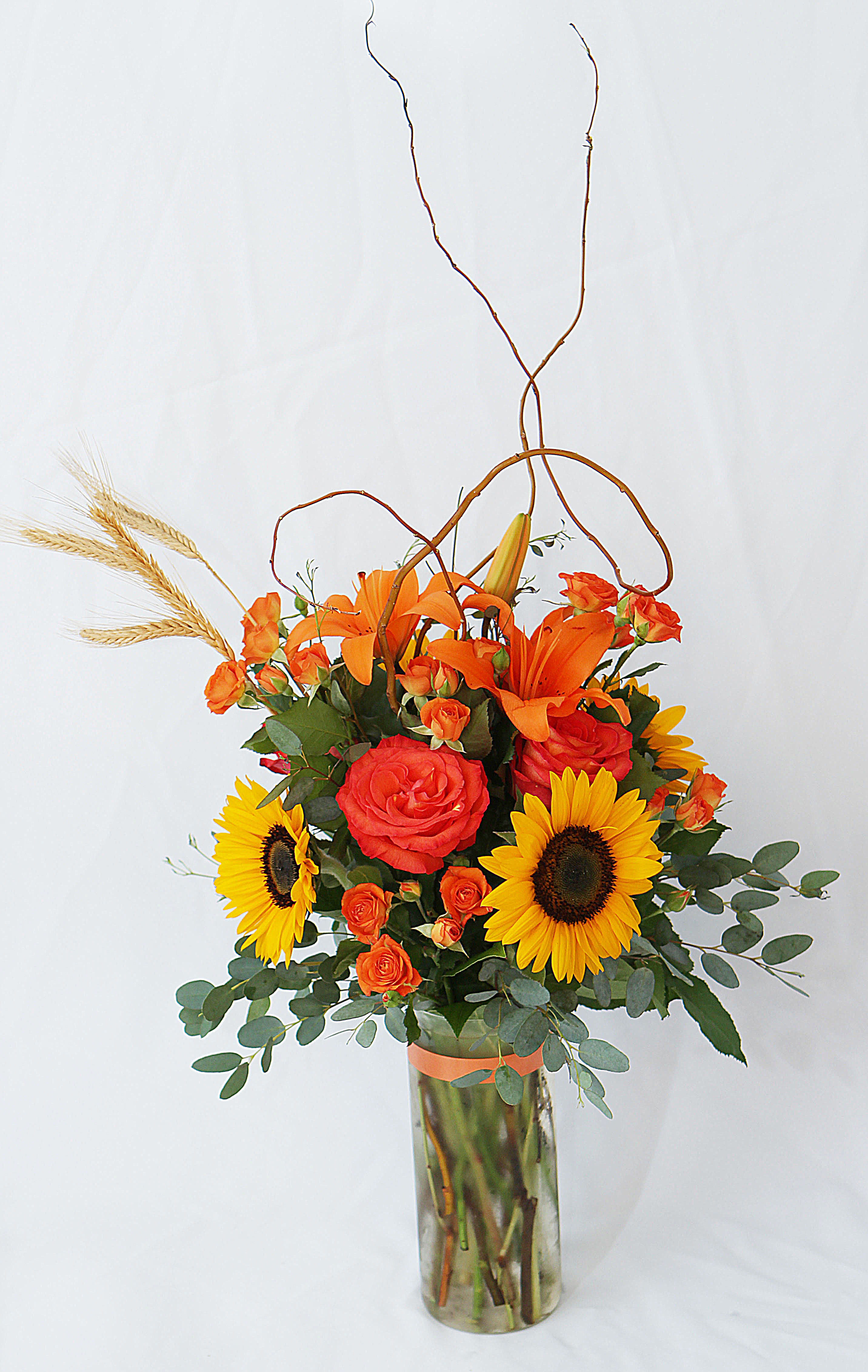 Hello Autumn Hello Autumn - Greet The New Season With This Heartwarming Sunflower And Rose Bouquet, Represented In A Tall Clear Vase.