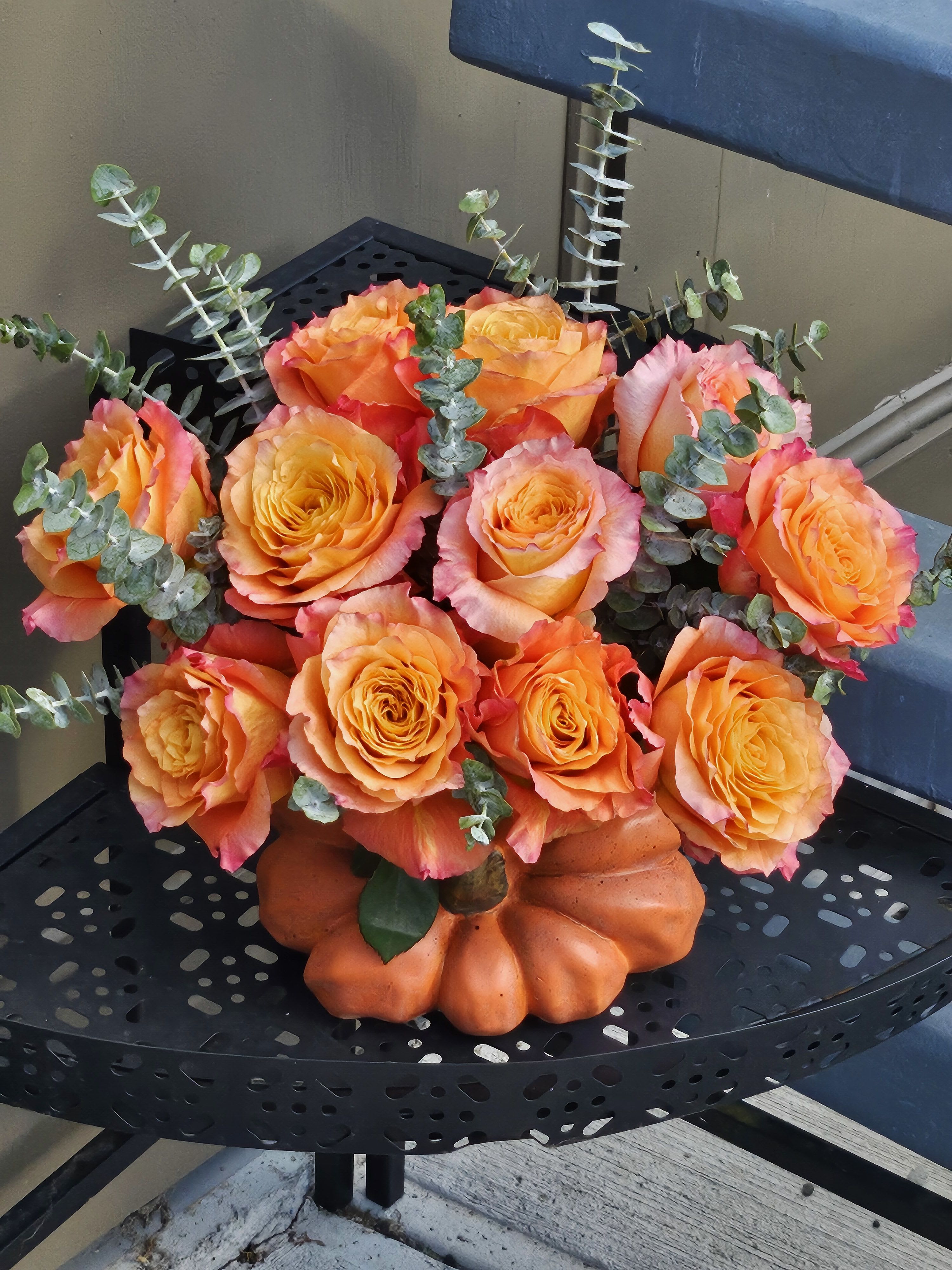 The Queen  - Chick roses -Free Spirit in a pumpkin vase. 