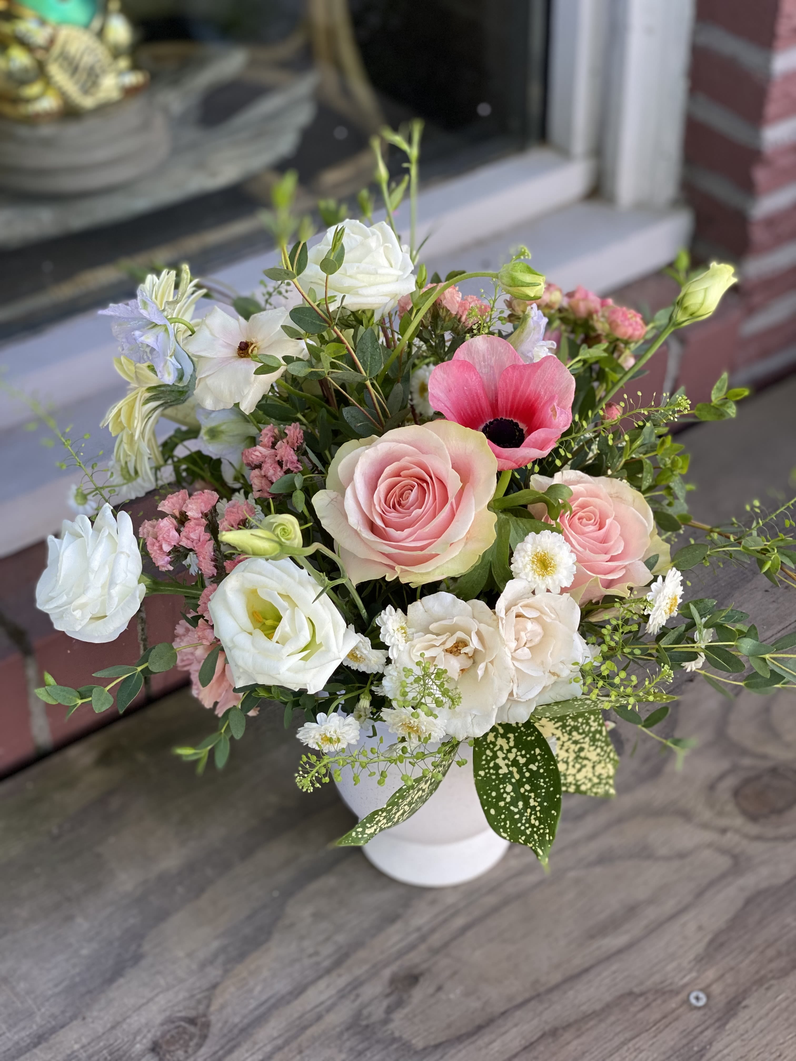 Muted Garden - Muted blooms for a soft, neutral arrangement.