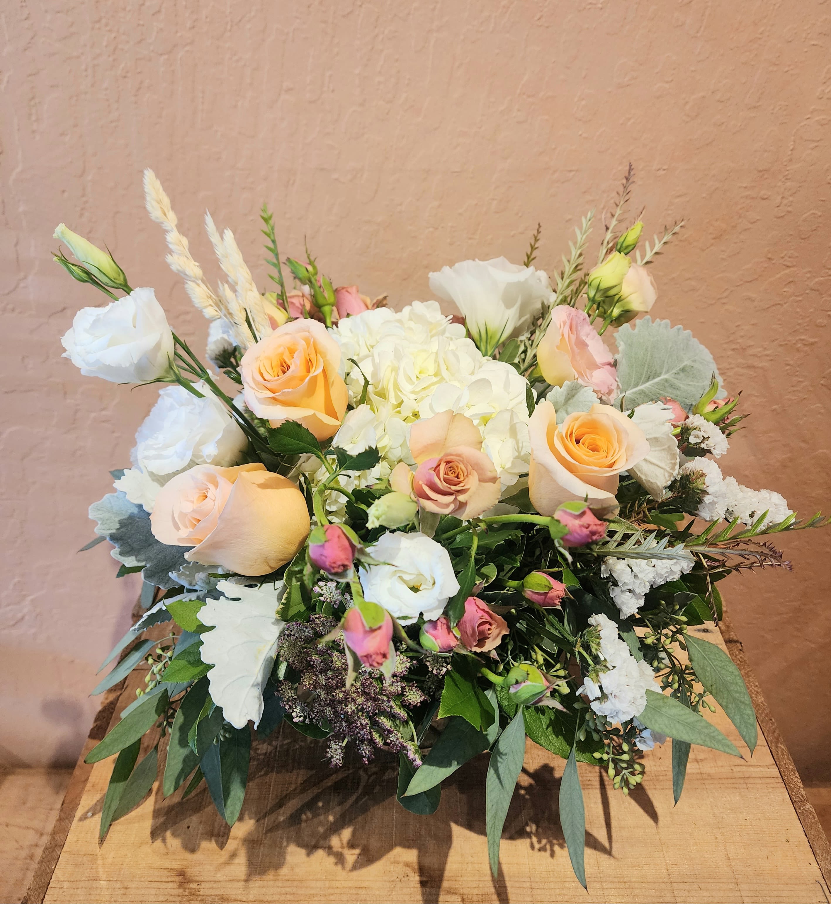 Peaches and Cream Peaches and Cream - Versatile low full arrangement. Garden style centerpiece. A classic timeless look for any occasion.
