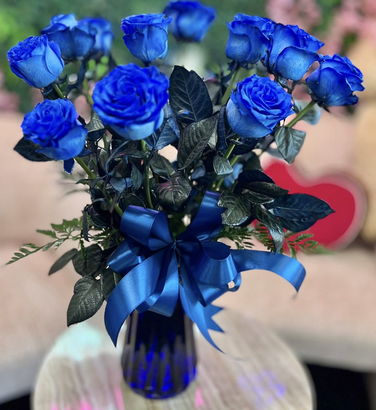 Mystic Blue - Unveil the captivating allure of Mystic Blue, an exquisite arrangement featuring the rare and enchanting beauty of blue Luxury Long Stemmed roses. Symbolizing mystery, uniqueness, and deep admiration, these striking roses are artfully arranged with soft greenery. Standar 12 Roses Deluxe 18 Roses Premium 24 roses 