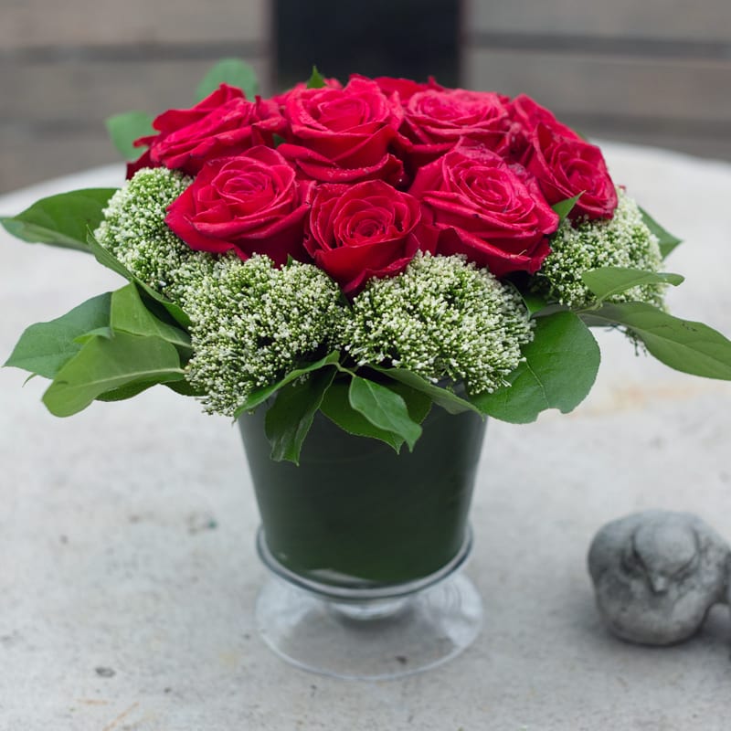 Rose Pedestal - Romantic arrangement featuring luscious red roses. 