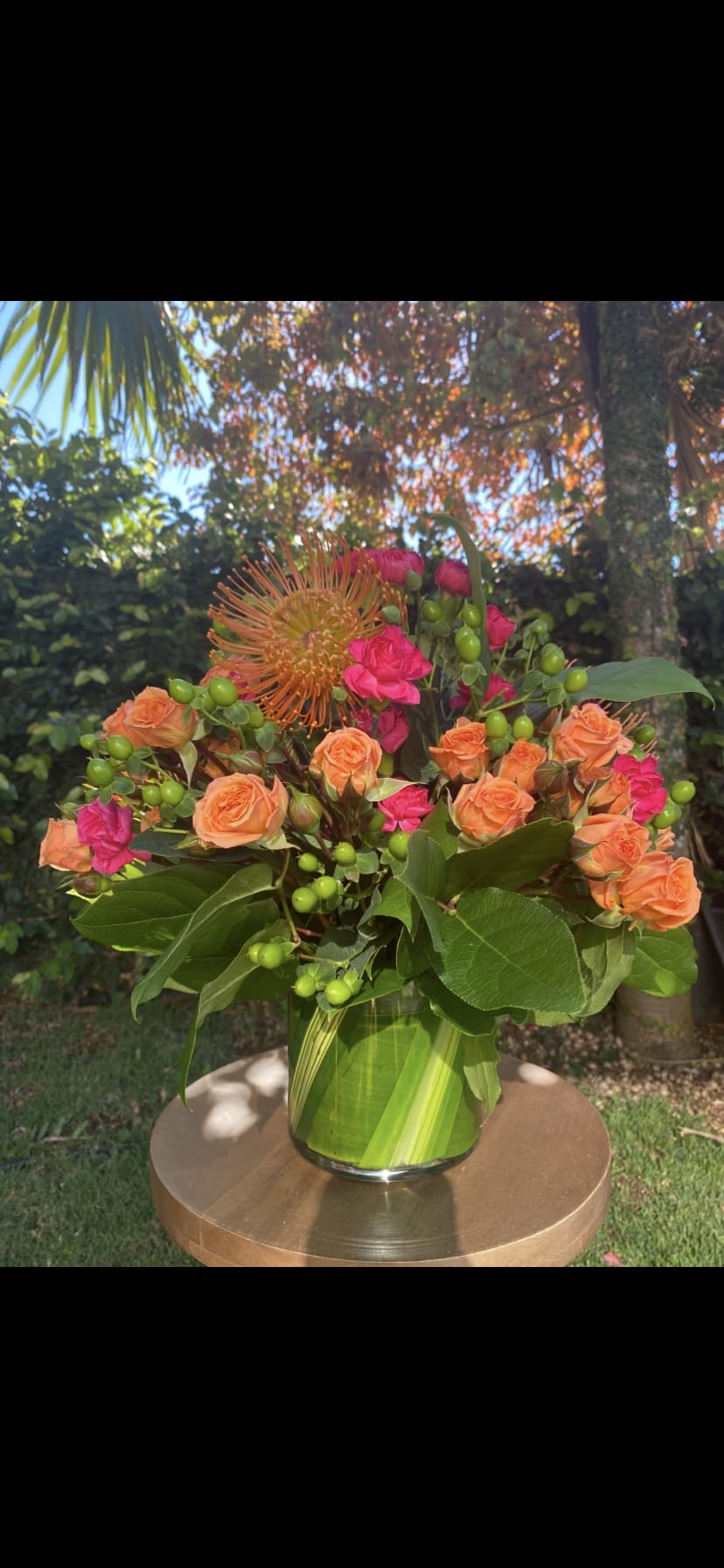 Designers Choice Tropical arrangement -  Great for any occasion or just because.   We will design a tropical bouquet mixed with traditional seasonal blooms 