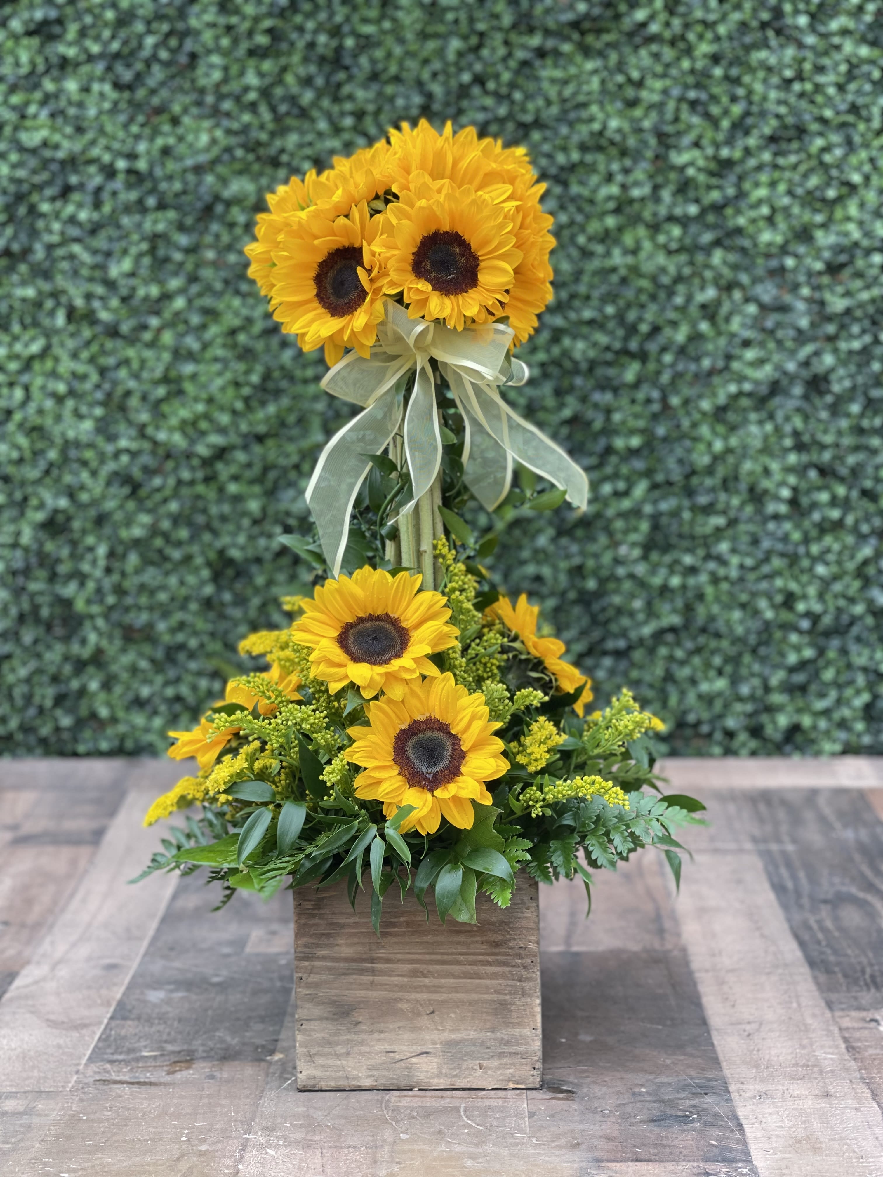 Sunny Daze - A bright and colorful sunflower topiary in a matching container.