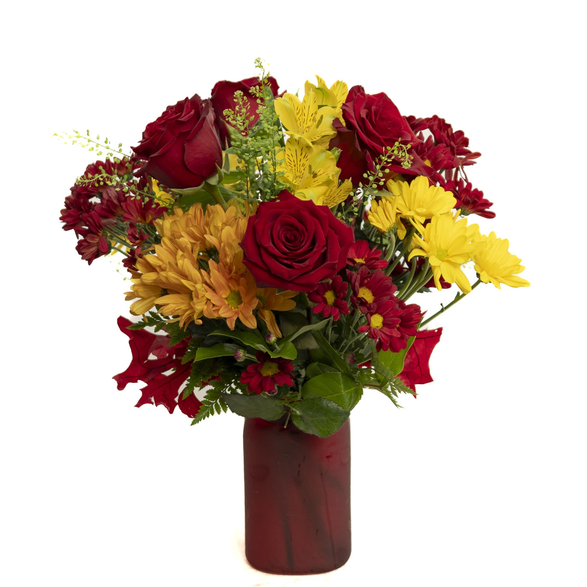 Harvest Glow Bouquet (red vase) - Celebrate the warmth of the season with the Harvest Glow Bouquet. Featuring rich red roses, golden yellow alstroemeria, vibrant mums, and deep red daisy poms, this arrangement radiates autumn charm. Designed in a rustic red vase, it makes the perfect gift to brighten any home, holiday table, or special occasion with festive color and cheer.