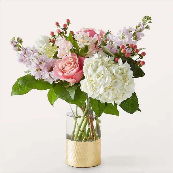 Little Luxuries Bouquet - Luxury arrives at their doorstep with this beautiful bouquet of soft pink and lavender accents creating a spa-like feel for a celebration, special day, or moment of remembrance.  Details The Premium Bouquet is approximately 17&quot;H x 15&quot;W. Designed by florists, ready to display. For long–lasting blooms, replace the water daily. We suggest trimming the stems every couple days. Pet Safety Precautions: This bouquet or plant may include flowers and foliage that are known to be toxic to pets. To keep them safe, be sure to keep this arrangement out of your pet's reach.  Bloom Details Rose Stock Alstroemeria Hydrangea Carnation