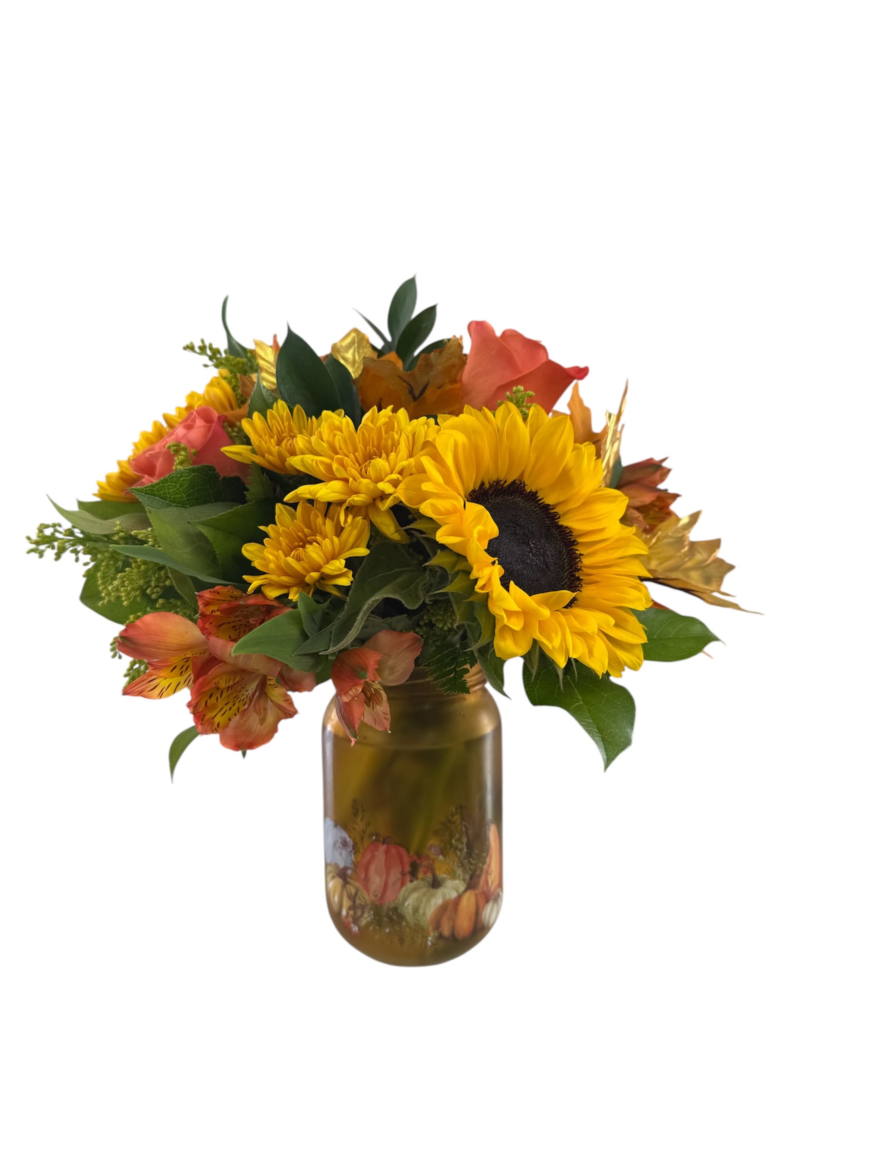 AUTUMN SPICE - Our Autumn Spice arrangement consists of an orange and yellow fall palette. The arrangement includes flowers such as sunflowers, roses, alstromeria, and chrysanthemums accented with golden rod and silk fall leaves.