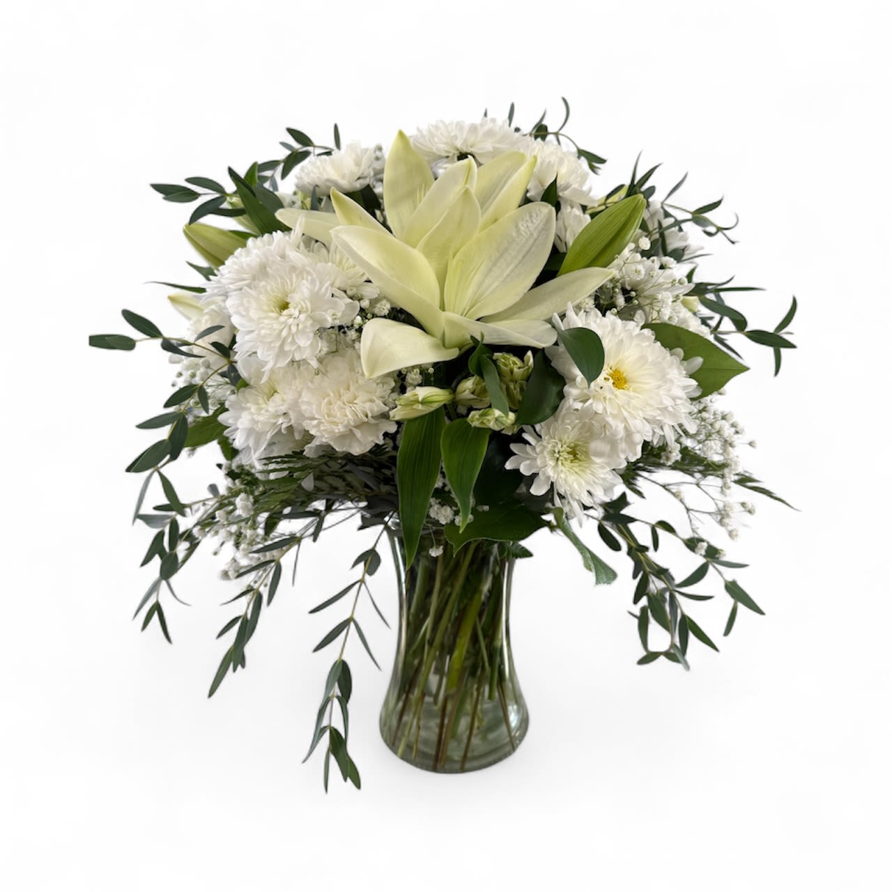 Angel Wings Arrangement Angel Wings Arrangement - This arrangement of pure white flowers consists of all white carnations, alstroemeria, daisy and Ccshion poms and lilies are lovingly designed in a clear glass vase.