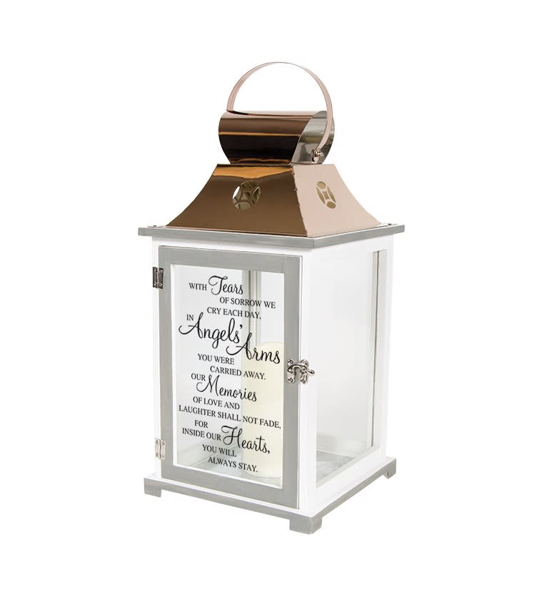 &quot;Angel's Arms&quot; Lantern - This decorative keepsake lantern reads &quot;With tears of sorrow we cry each day, in Angel's Arms you were carried away. Our memories of love and laughter shall not fade, for inside our hearts you will always stay&quot;. It is made of white composite wood with a copper finish top and is 12&quot; tall. It contains a flameless LED candle. Suitable for hanging or use as a freestanding item. Recommended as an accent in floral arrangements for many occasions. It can be purchased individually or with an accompanying floral arrangement (Deluxe).