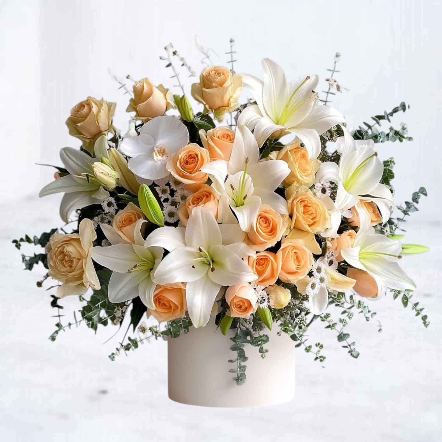 Ivory Solace Tribute Ivory Solace Tribute - Graceful and soothing, the Ivory Solace Tribute offers a refined expression of sympathy and remembrance. This large, heart-shaped arrangement features creamy white lilies, ivory orchids, peach spray roses, and soft filler blooms, all thoughtfully arranged against a backdrop of lush eucalyptus for a flowing, elegant silhouette. Designed for funeral services, memorials, or as a heartfelt gesture to grieving loved ones, this arrangement brings comfort and quiet beauty in moments when words fall short.