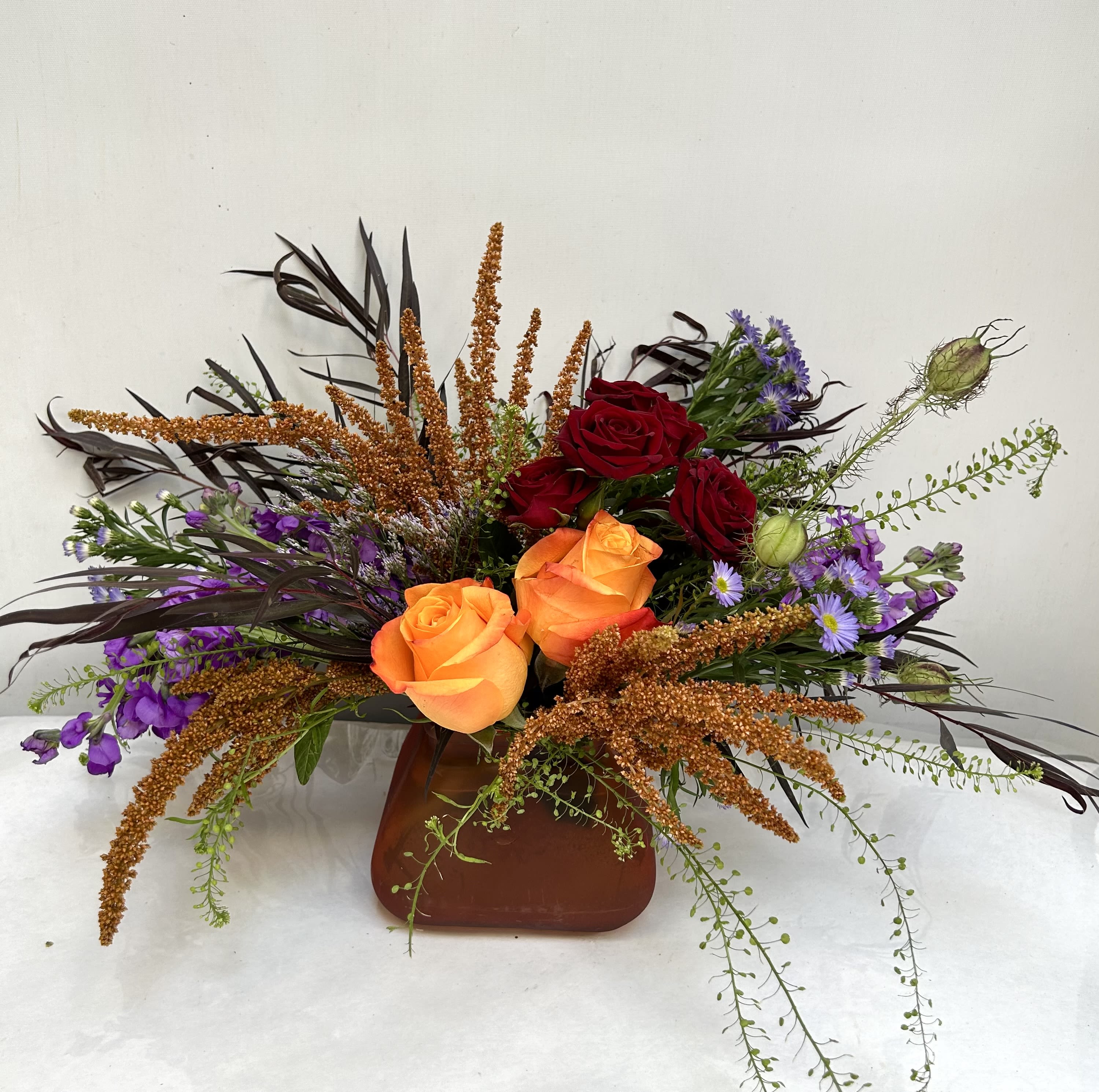 Radiant Blooms - Beautiful colors, including roses, spray roses, stock and many more. 