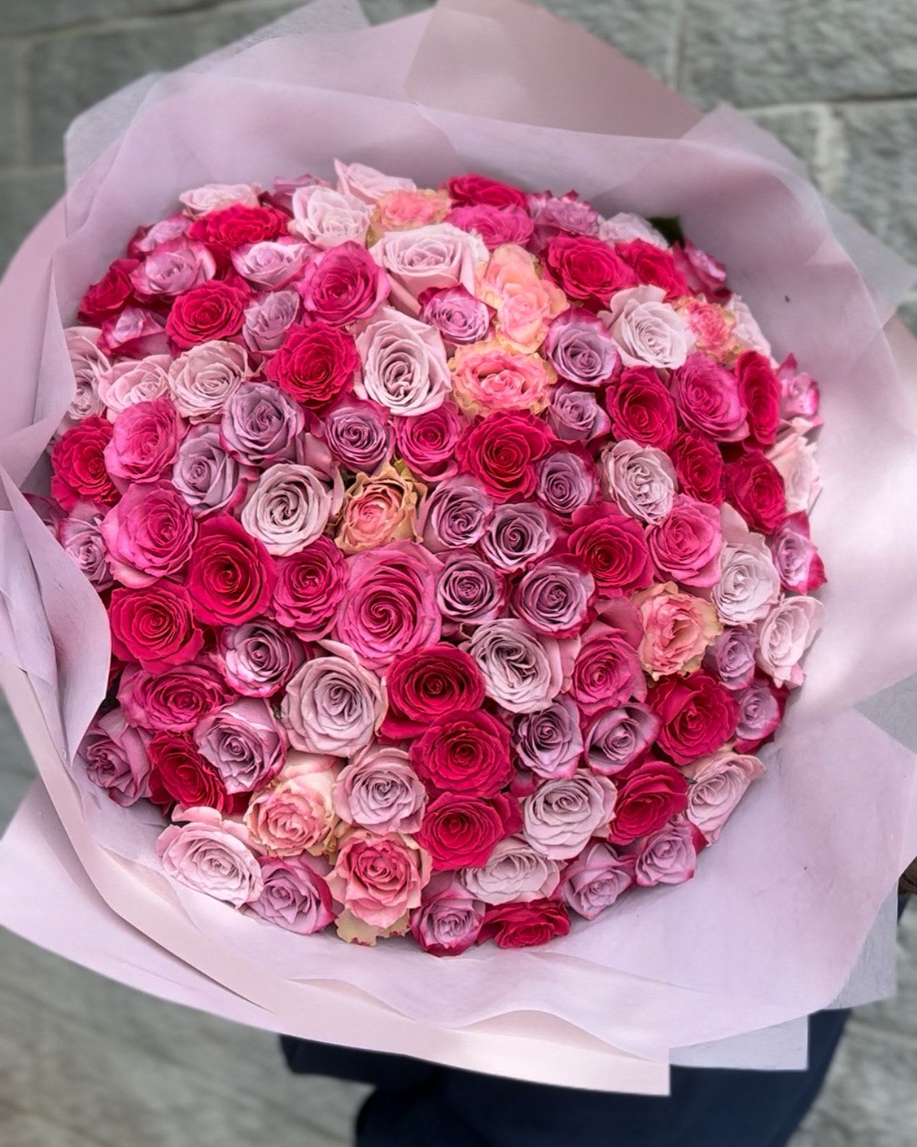 Breathtaking bouquet - 101 long-stem roses, beautifully arranged in elegant wrapping.  Please let us know your choice of color or a mix of colors during check out!
