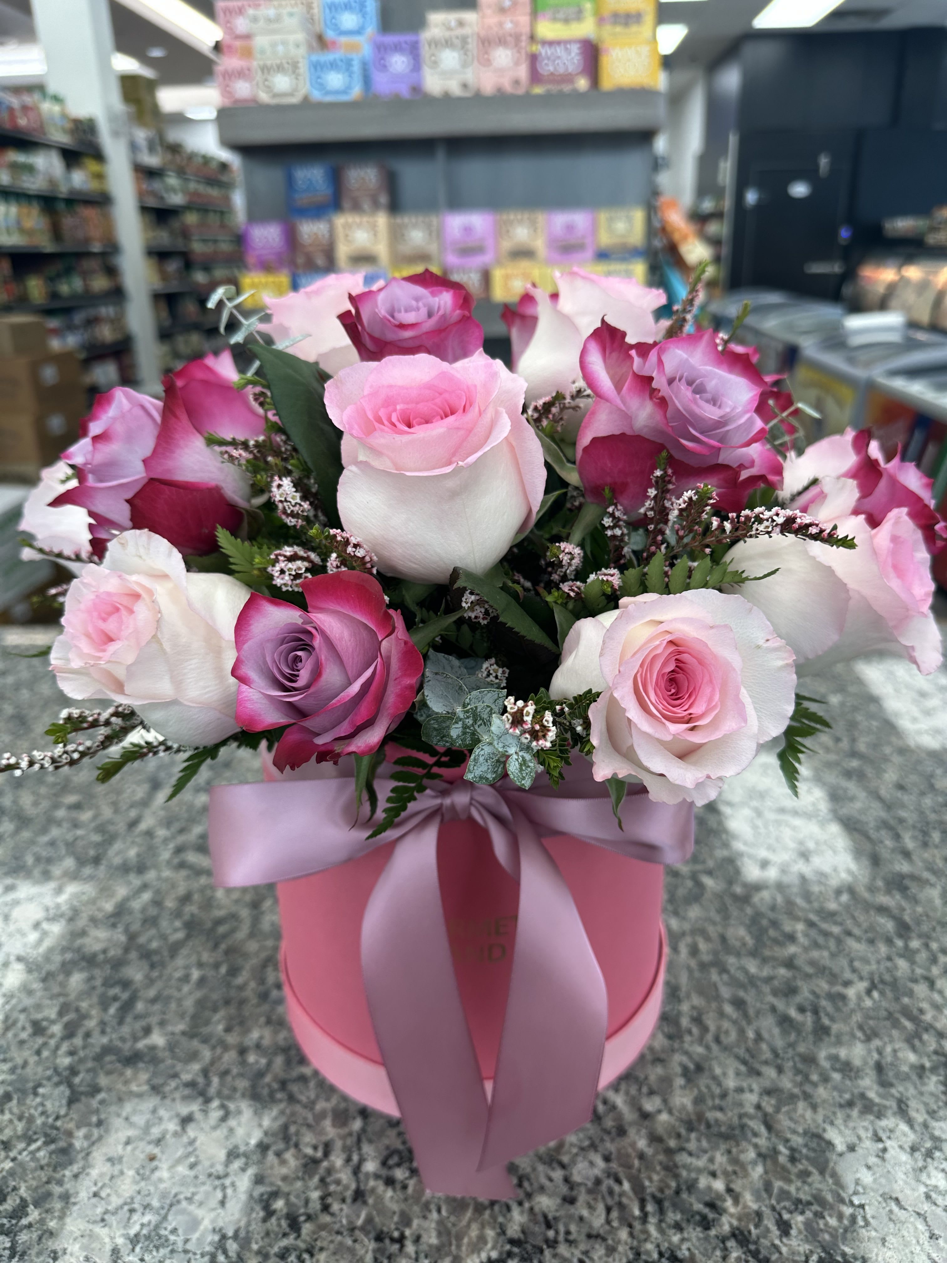 Elena - A perfect blend of roses and greenery, arranged in our signature custom hat boxes for an elegant everyday touch.