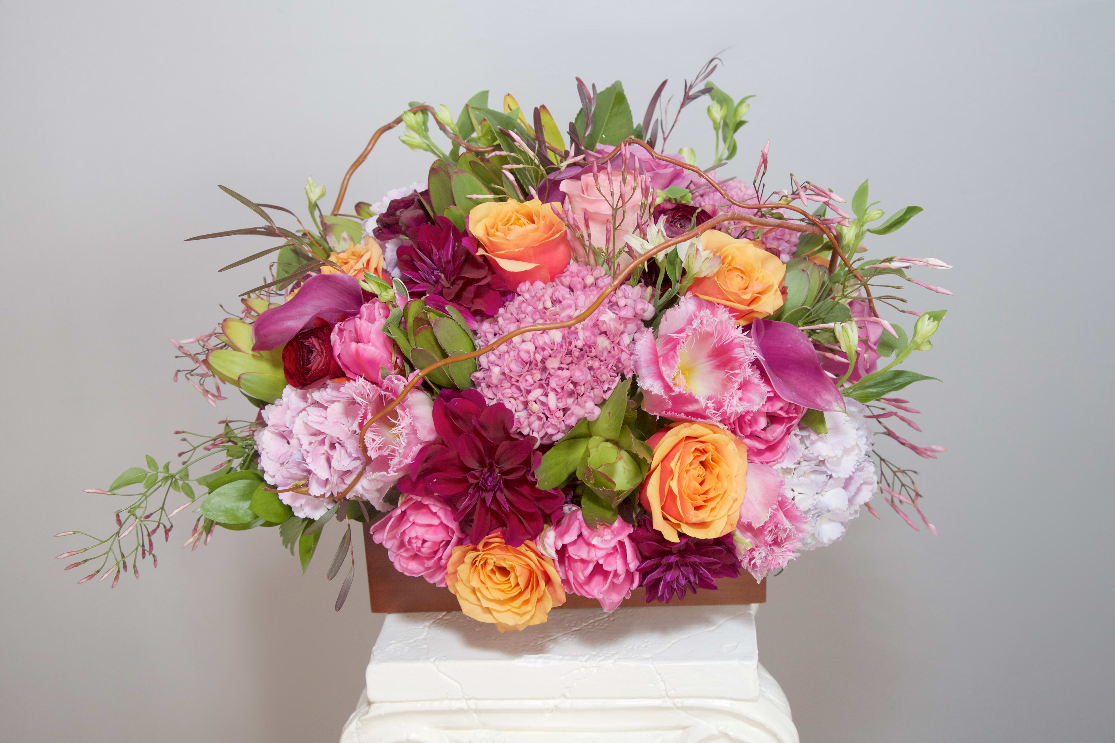 Forest Knolls Knowing - Show your elegance and sweet confidence with this colorful beauty of an arrangement composed of: Hydrangea, Calla Lily, Roses, Dahlias, Tropical Greens...