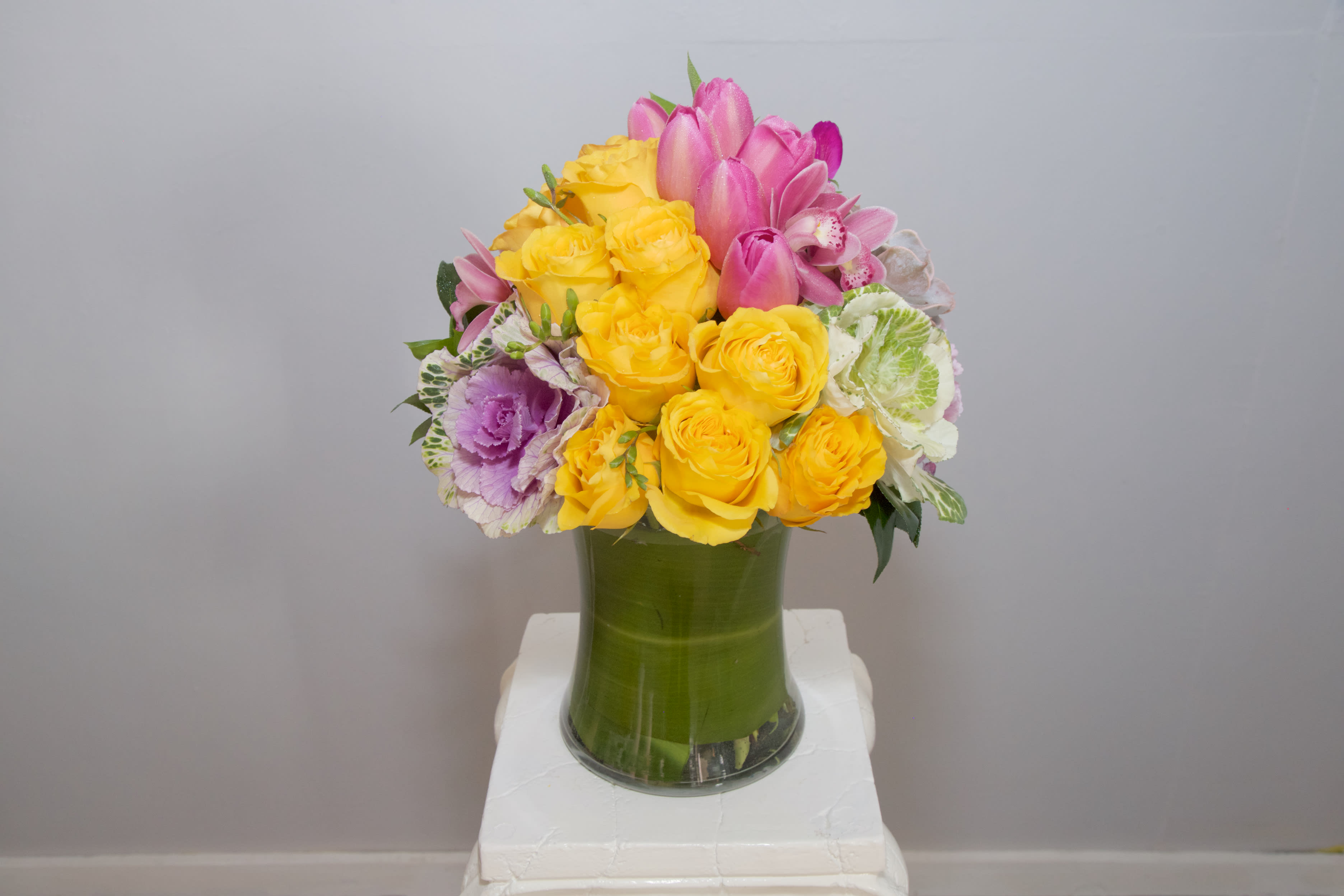 Krissy Field Fun - Lift your loved ones' spirits with this brilliant arrangement of Succulents, Roses, Cabbage Flower, Tulips, Hydrangeas...