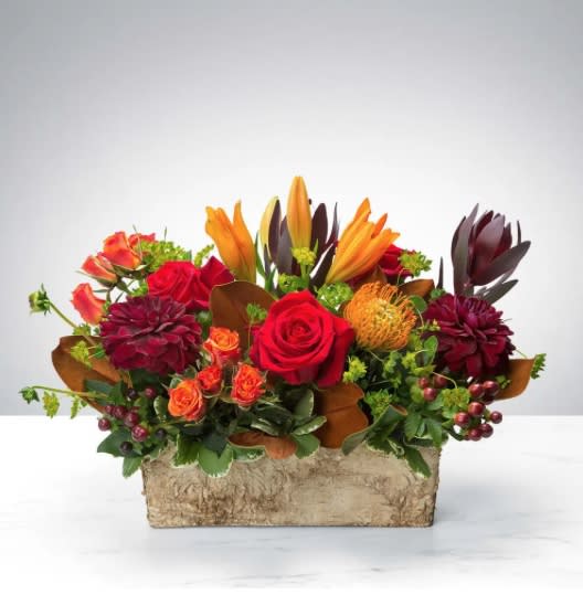 Box of Autumn by BloomNation™ - Wouldn’t life be more convenient if seasons came in boxes? We already have boxed wine, boxed lunches, and boxing matches. Seasons need to catch up. Now they have. Introducing the Box of Autumn by BloomNation. Whoever you’re sending this to will smile with seasonal joy upon receiving this abundant box of seasonal blooms. 