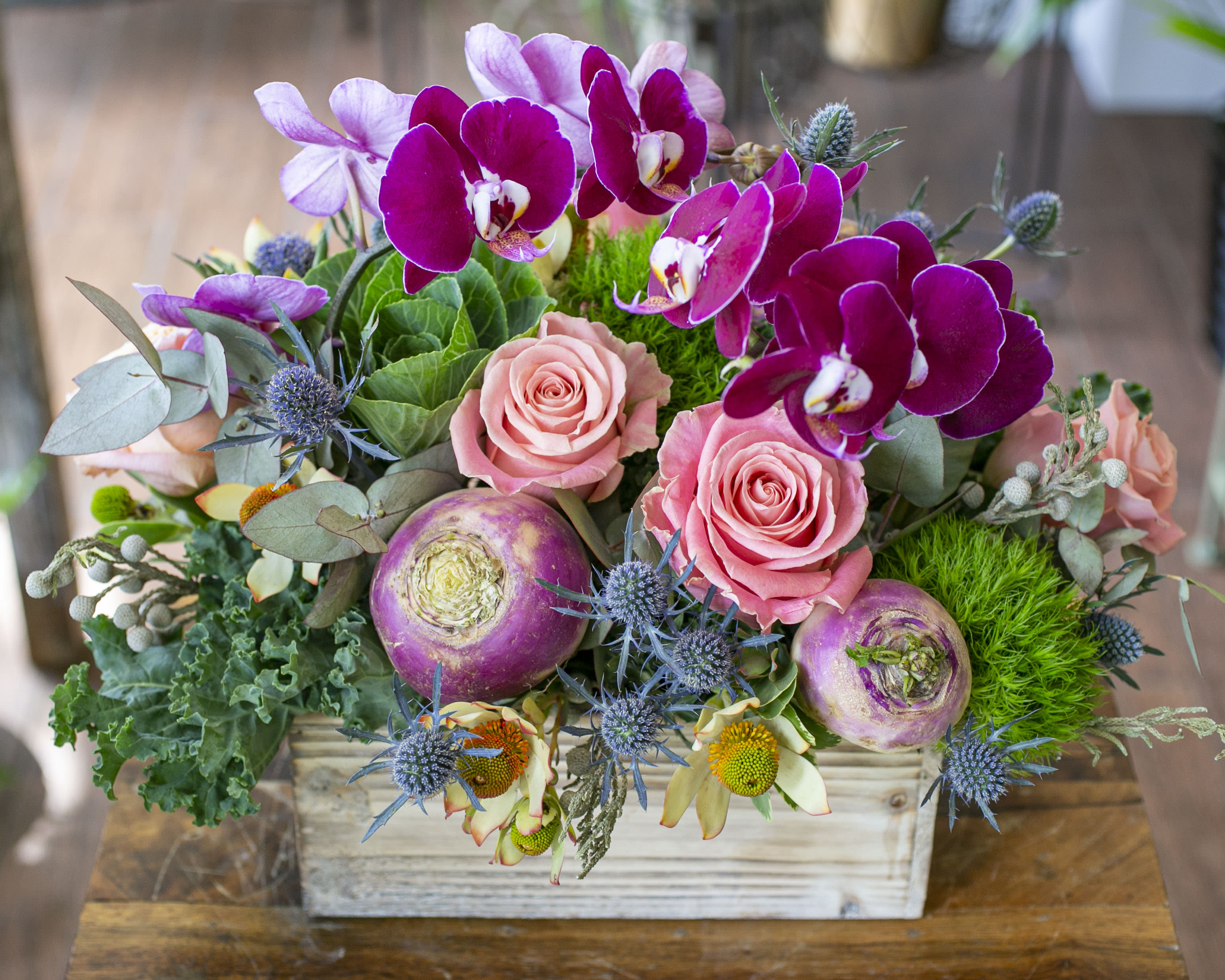 Amber - &quot;Amber is the color of your energy.&quot; Orchids, Rutabaga, Kale, Roses, Leucadendron and Thistle with seasonal accents, arranged in a wooden box.