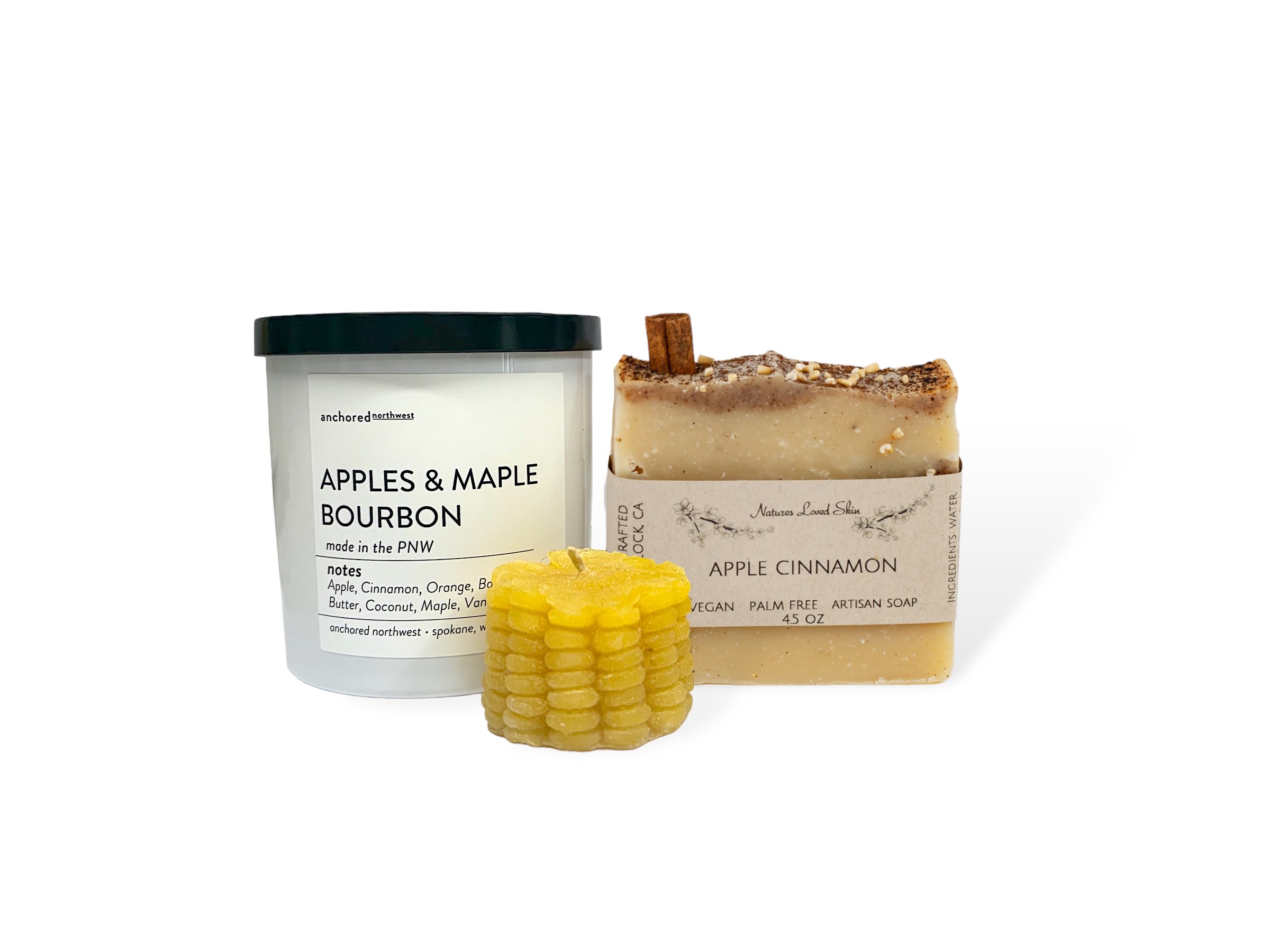 Taste of Fall - Taste of Fall Gift Set.  Lit Rituals Mini Corn soy wax candle  Notes: Buttery Popcorn   Anchored Northwest’s Apple and Maple Bourbon Candle Aprox. burn time: 60hrs Notes: apple, cinnamon, orange, bourbon, butter, coconut, maple, vanilla.  Ingredients: fragrance oils infused with essential oils, 100% American-grown soy wax, untreated cedar wood wicks.  Apple Cinnamon Soap 4.5 oz is by Nature’s Loved Skin Vegan Artisan Fragrance Soap. Reminiscent of Granny’s kitchen with scents of Apple Pie made with Granny Smith apples and Cinnamon sugar. Ingredients: Water, Saponified Oils: Olive Oil, Organic Coconut Oil, Rice Bran Oil,  Organic Shea Butter, Phthalate free Fragrance, Organic Jojoba Oil, Cinnamon powder, Steel cut Oats, Cinnamon stick. 