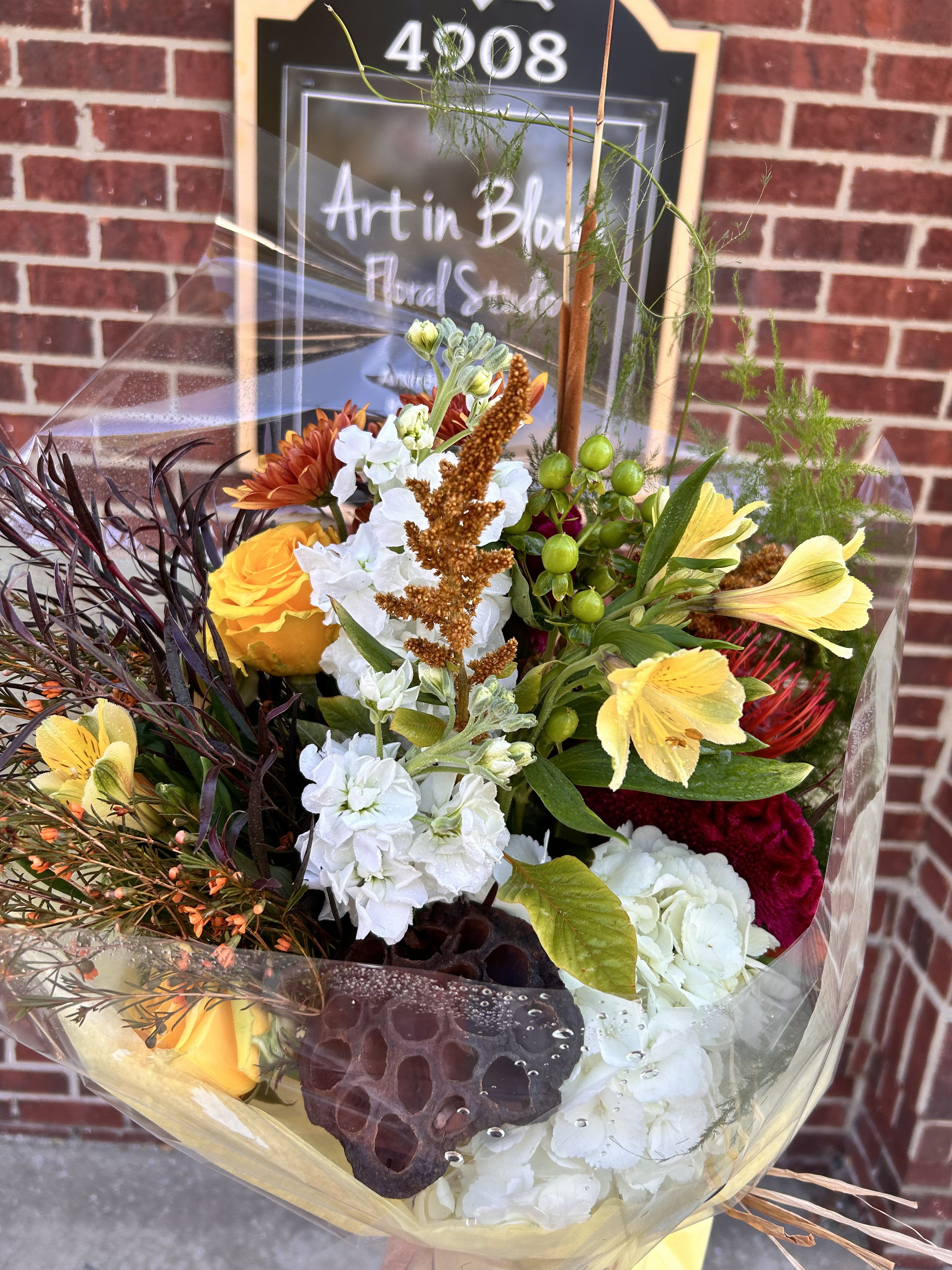 Designer's Choice Bouquet- no vase - Let our designers select the nicest blooms from our inventory to create a gorgeous fresh bouquet that fits the season. The bouquet will be delivered with a water pack at the base for optimum freshness.
