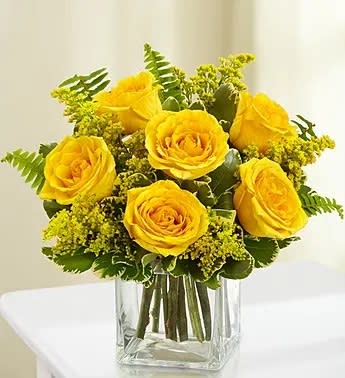 Cherished in Yellow - 6 yellow roses in a clear cube with sword fern and solidago