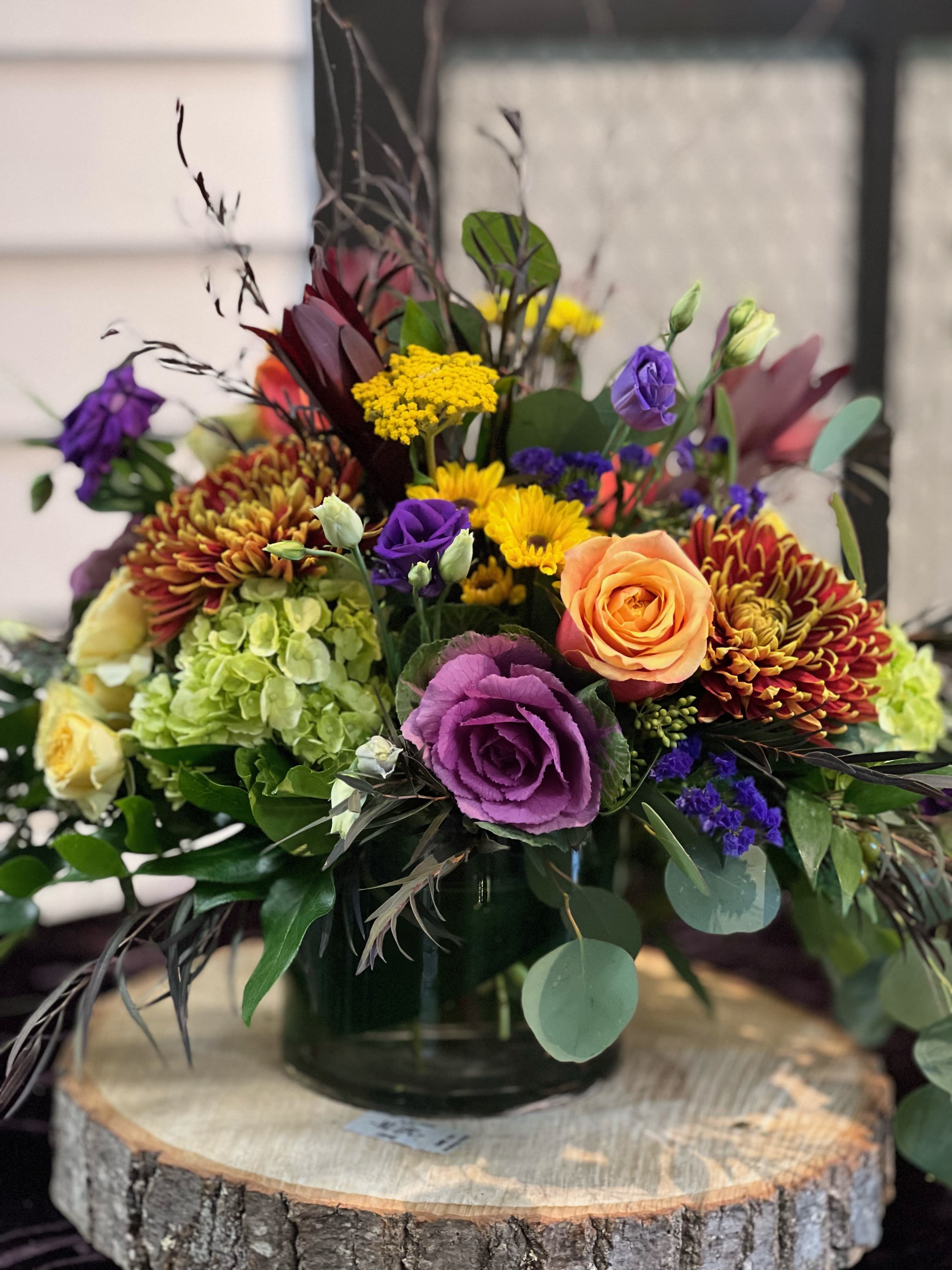 Fall Splendor - Beautiful fall vase arrangement that includes a nice variety of flowers. Designed in a clear glass vase. Flowers and colors may vary! LOCAL DELIVERY ONLY PLEASE!!!