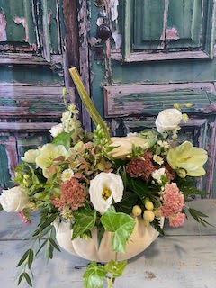 Pumpkin Spice Pumpkin Spice - Fall is in the air and so is our festive Pumpkin Spice seasonal favorite. Beautiful lisianthus, sedum, roses and orchids makes for an extra special Autumn delight.