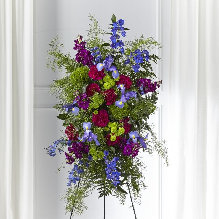 TLSP Heavenly Skies Standing Spray - carnations, poms, iris, blue delphinium, stock 