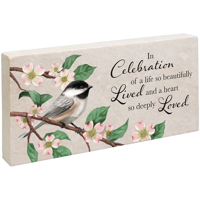 Marble Paver Plaque 'In Celebration of a Life' Marble Paver Plaque 'In Celebration of a Life' - Marble Paver - 'In celebration of a life so beautifully lived and a heart so deeply loved.' Natural stone, may include imperfections. Weather friendly.