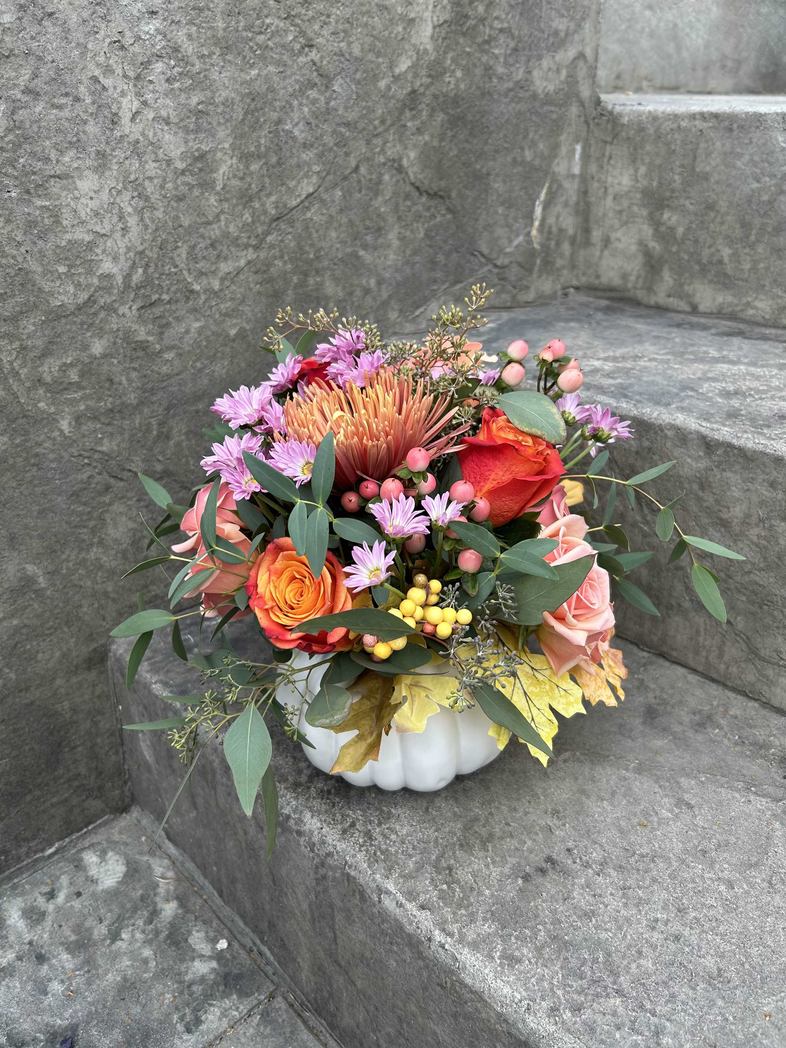 Colorfull Harvest  - Pumpkin harvest is upon us, ceramic pumpkin with roses, , daisy poms, berries, chrysanthemums, with blooming fillers and seeded eucalyptus.