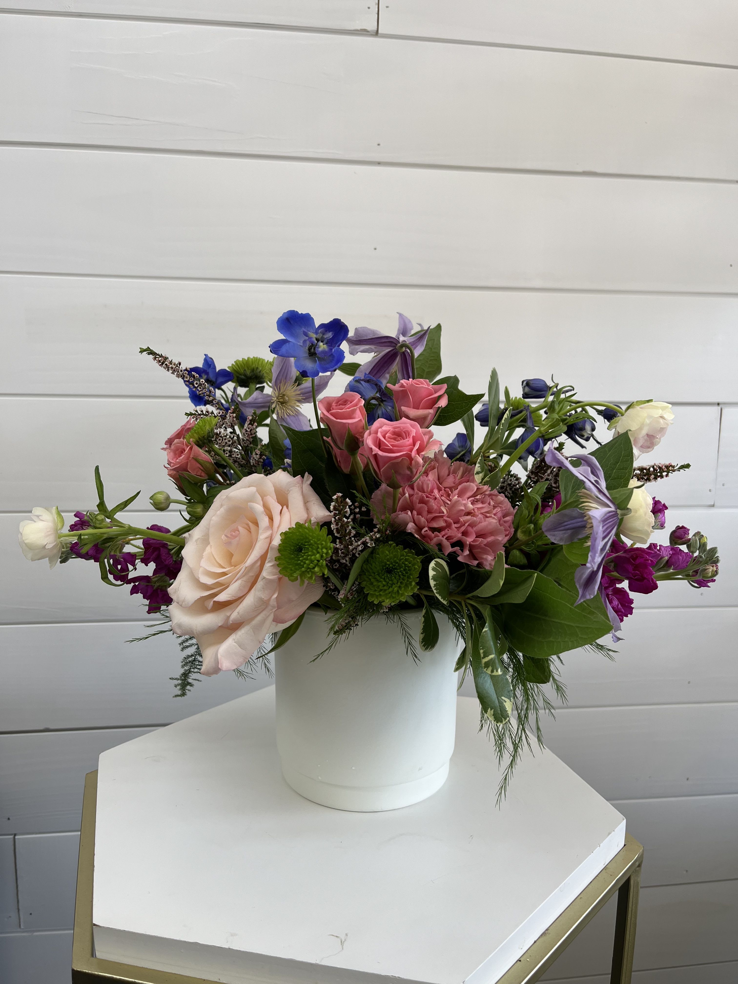 Grace Grace - A cheerful burst of color, this multicolored flower arrangement blends vibrant blooms to brighten any space or occasion.