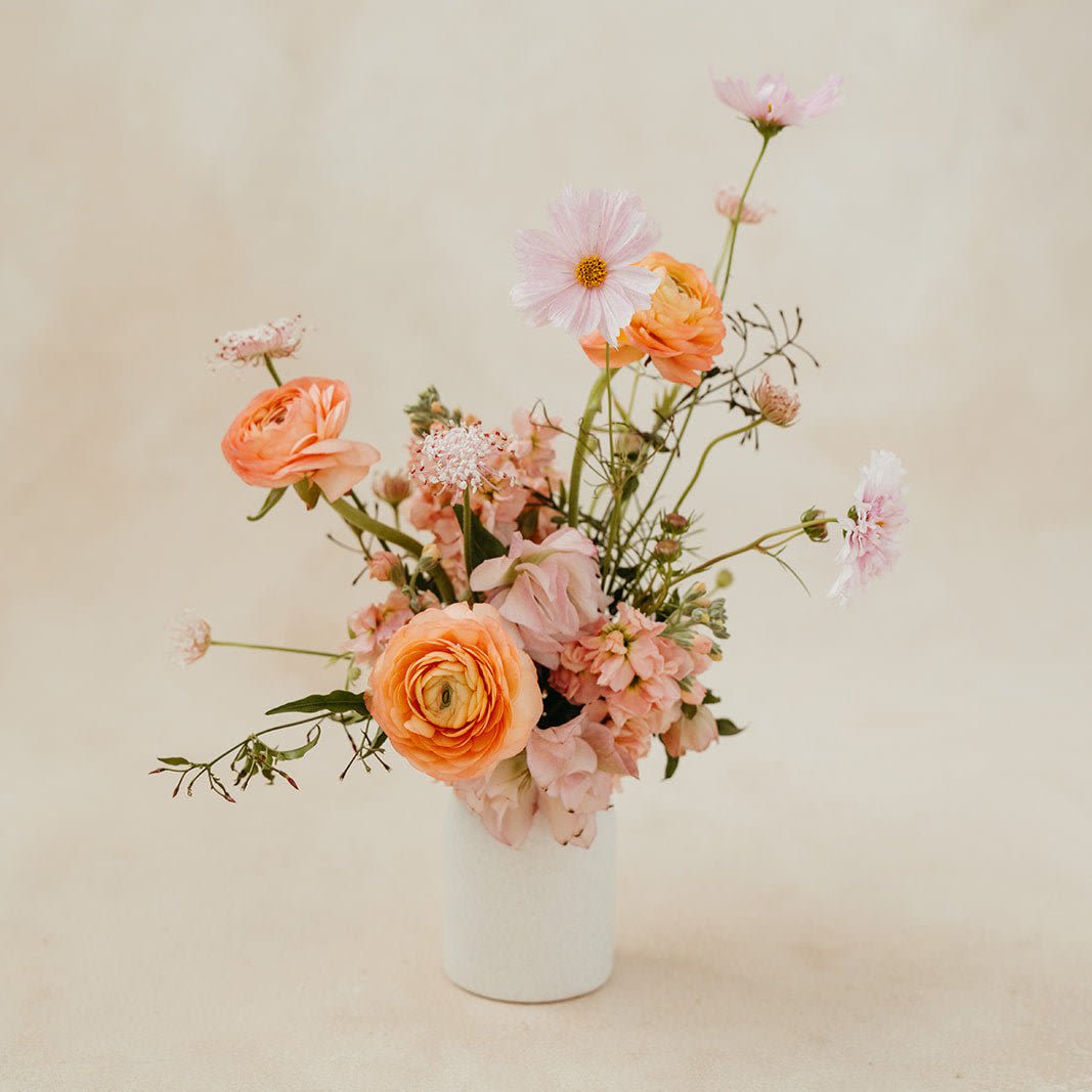 Designers Whimsy! Designers Whimsy! - This fun little vessel will delight. Seasonal Blooms with sculptural elements and a bit of whimsy. What is not to love.