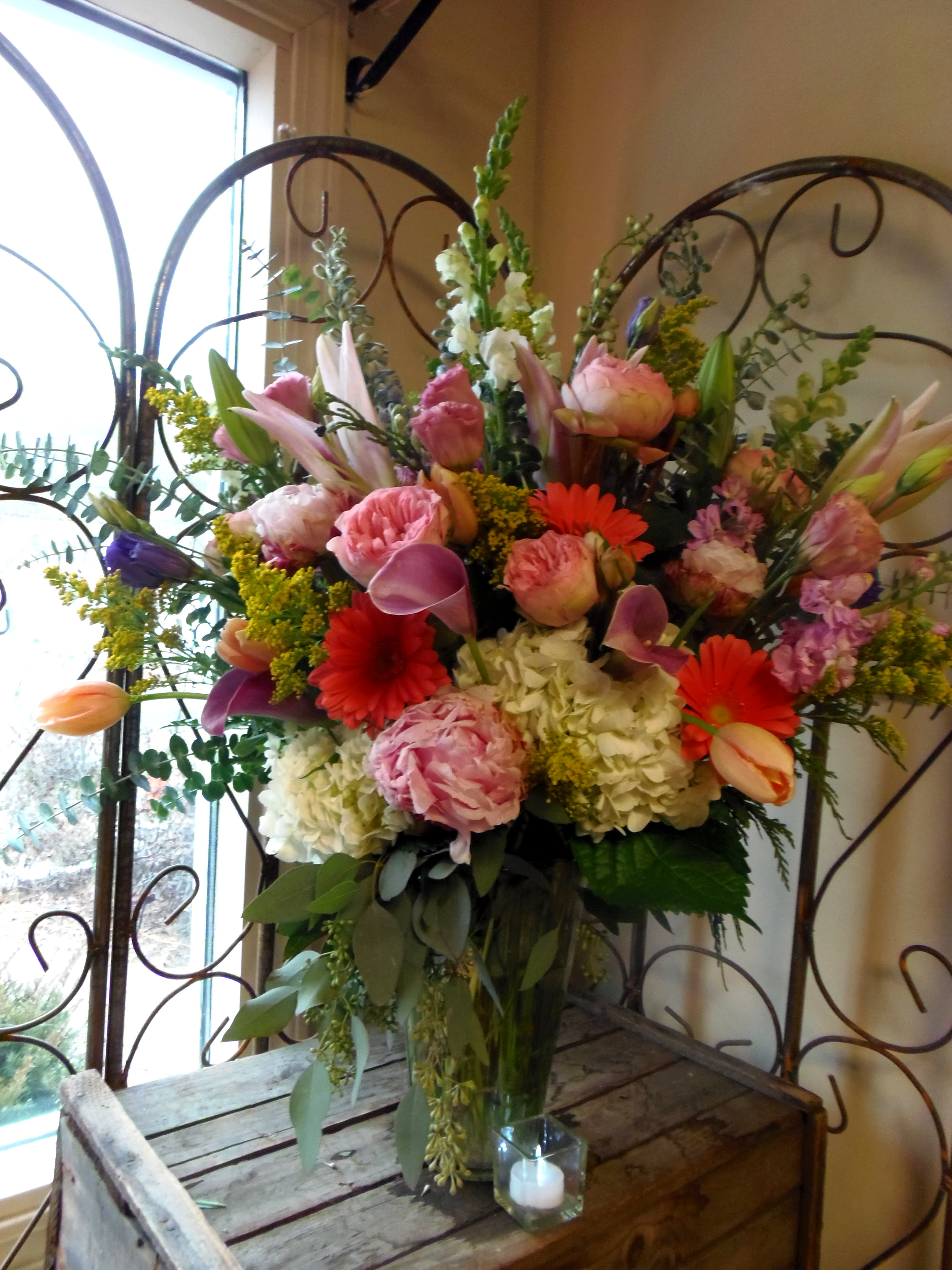 Leave  Me Speechless 16v30 - When you want a gift that's sure to impress, send this stunning garden  display, bursting with a beautiful variety of flowers from, French tulips, lisanthus, lilies, gerbera,  Garden roses and more. -an elegantly exquisite design that stands out from the crowd. This opulent bouquet is beautiful and luxurious~ it's simply magnificent! 