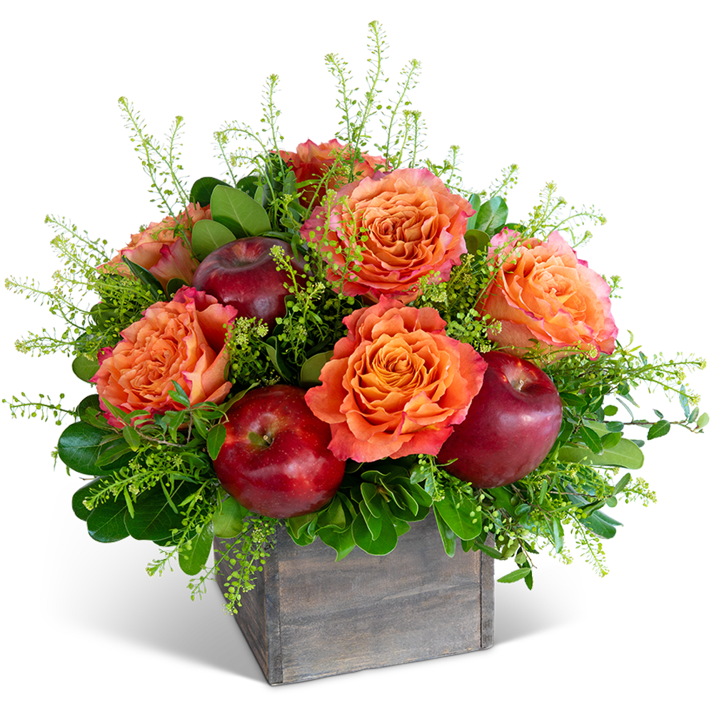 Rosy Orchard Harvest - Experience the enchanting beauty of our Rosy Orchard Harvest design, featuring stunning roses, premium foliage, and nestled apples for a touch of whimsical charm in a wooden cube container. This unique combination of blooms and fruit creates a lush and vibrant display that will brighten any space with its natural elegance. Consider upgrading for an even more lavish arrangement.