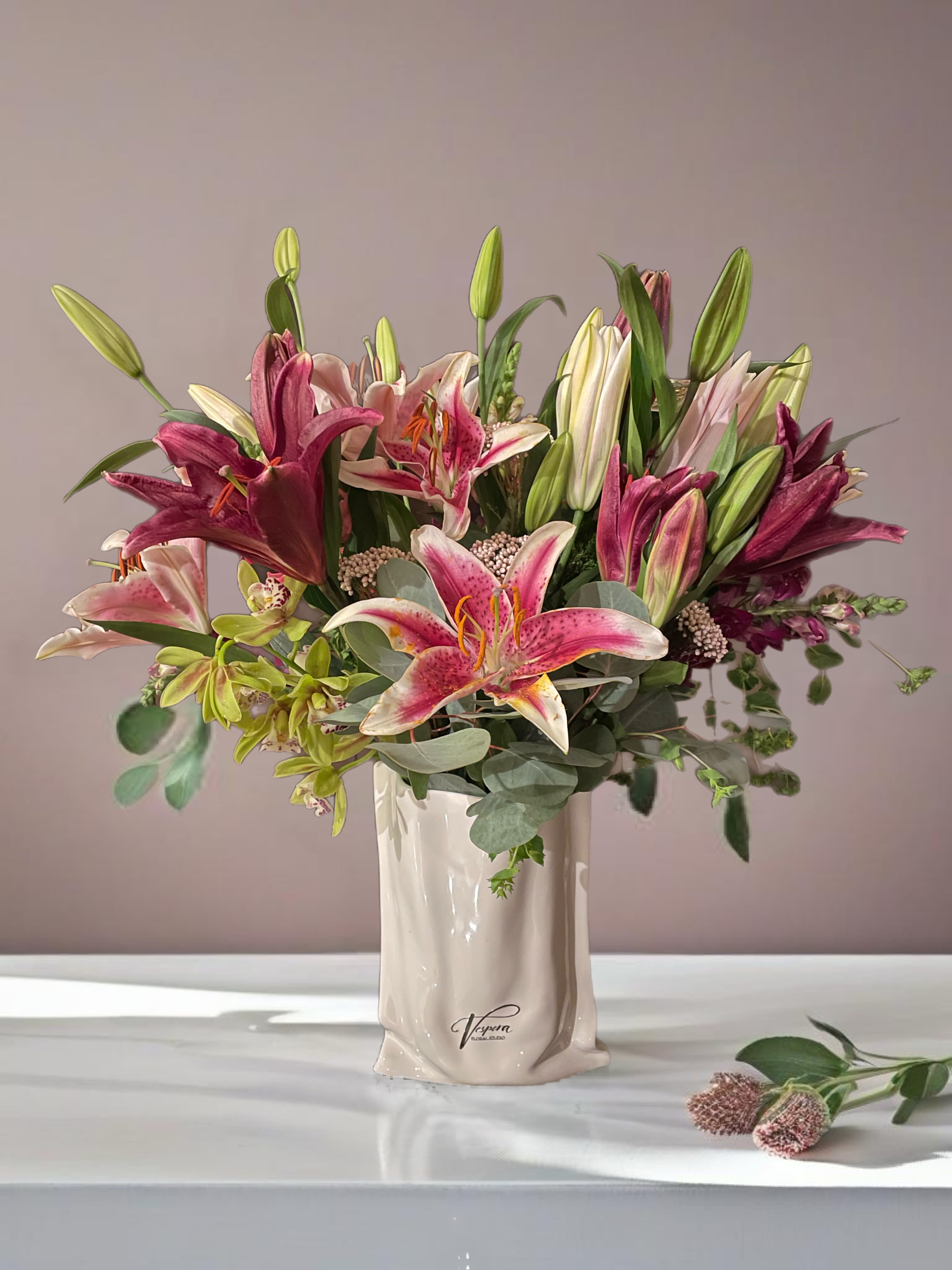 Stargazing with you  - Stargazer lilies are a popular hybrid flower created by horticulturist Leslie Woodriff in the 1970s. They are known for their large, star-shaped pink blossoms with white edges and dark spots, along with a strong, sweet fragrance.   Key Points: - Appearance: Vibrant pink petals that curve backward. - Fragrance: Strong and sweet, ideal for arrangements. - Cultivation: Prefers well-drained soil and full sun. - Symbolism: Represents purity and beauty.  These lilies are a favorite for gardens and special occasions due to their striking look and lovely scent. Enjoy them if you don’t have pets at home.   Attention!  -Stargazer lilies are highly toxic to cats and can cause severe kidney damage or even death if ingested. Symptoms of lily poisoning in cats include vomiting, lethargy, loss of appetite, and increased thirst. It's crucial to seek immediate veterinary attention if you suspect your cat has ingested any part of a lily.  -For dogs, Stargazer lilies are not considered as toxic, but they can still cause mild gastrointestinal upset if consumed. However, it's best to keep all types of lilies out of reach of pets to avoid any potential issues. If you have pets, consider choosing pet-safe plants to ensure their safety 