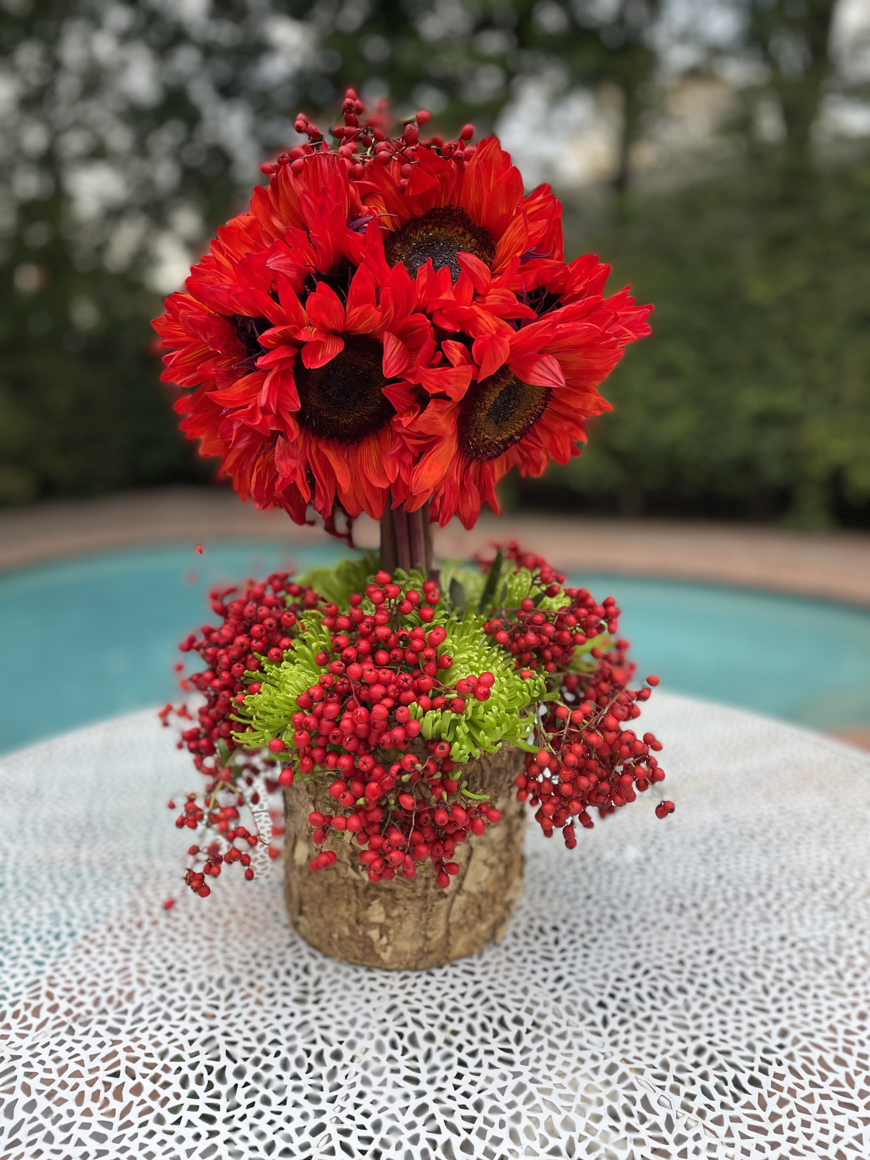 Red sunflowers  - Red sunflowers with holly berries and Burch tree vase is our favorite centerpiece during winter celebrations . We hope you will like it too ! 
