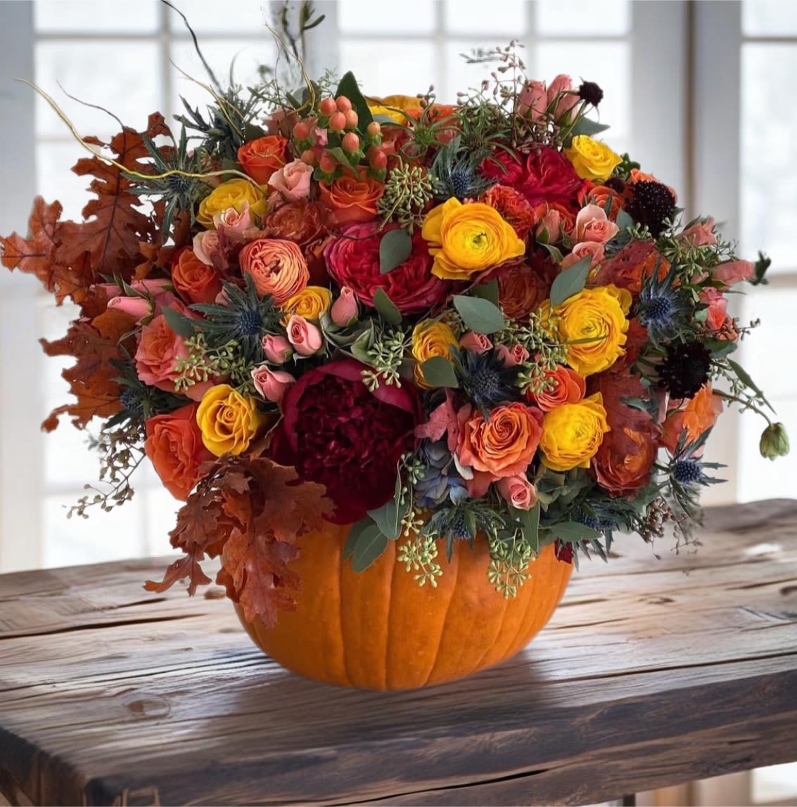 Fancy pumpkin !  - Our pumpkin floral design is a true masterpiece that defies expectations and leaves a lasting impression. Its impressive combination of natural elements and artistic vision creates a visually stunning display that is sure to captivate and delight all who have the privilege of encountering it.