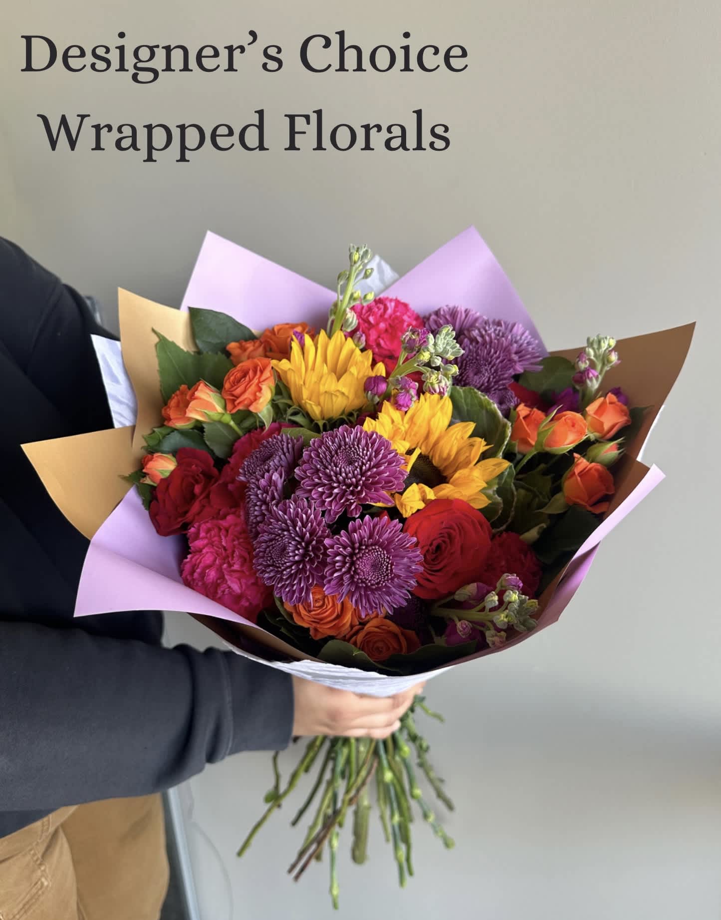Designer's Choice Wrapped Florals Designer's Choice Wrapped Florals - Give our designer's creative freedom to build you a mix of the fresh flowers we have available in store. This bouquet is wrapped and will not come in a vase.