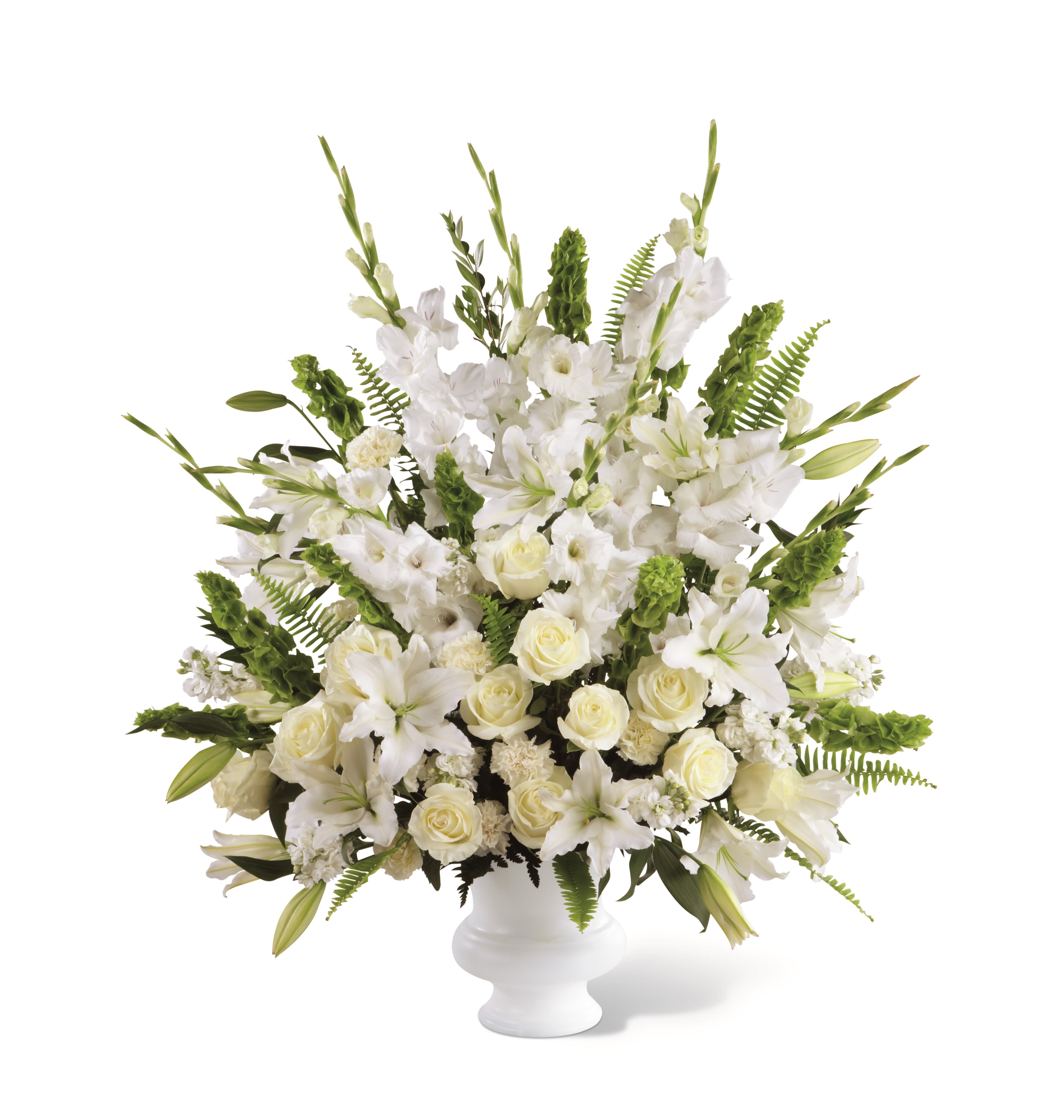 TLSP The Morning Stars Arrangement - The Morning Stars Arrangement is a brilliant expression of peace and soft serenity. White roses, carnations, gladiolus, stock and Oriental lilies are accented with the bright green stems of Bells of Ireland and a gorgeous assortment of lush greens, while seated in a designer plastic urn to create a beautiful way to honor the life of the deceased. GOOD arrangement includes 31 stems. Approximately 36&quot;H x 30&quot;W. BETTER arrangement includes 43 stems. Approximately 40&quot;H x 32&quot;W. BEST arrangement includes 55 stems. Approximately 45&quot;H x 36&quot;W.  Your purchase includes a complimentary personalized gift message.